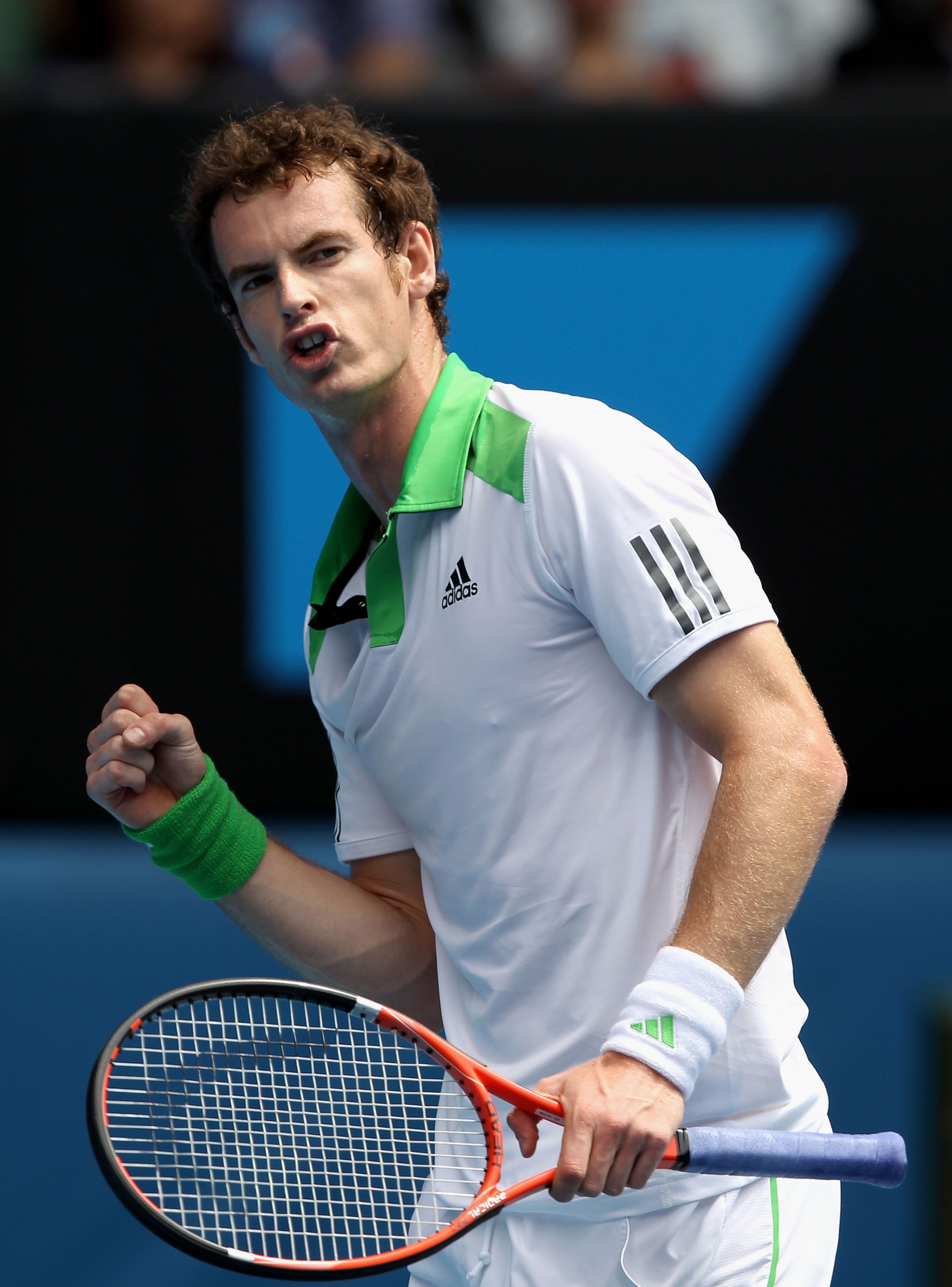 MELBOURNE, AUSTRALIA - JANUARY 24:  Andy Murray of Great Britain celebrates winning his fourth round match against Jurgen Melzer of Austria during day eight of the 2011 Australian Open at Melbourne Park on January 24, 2011 in Melbourne, Australia.  (Photo