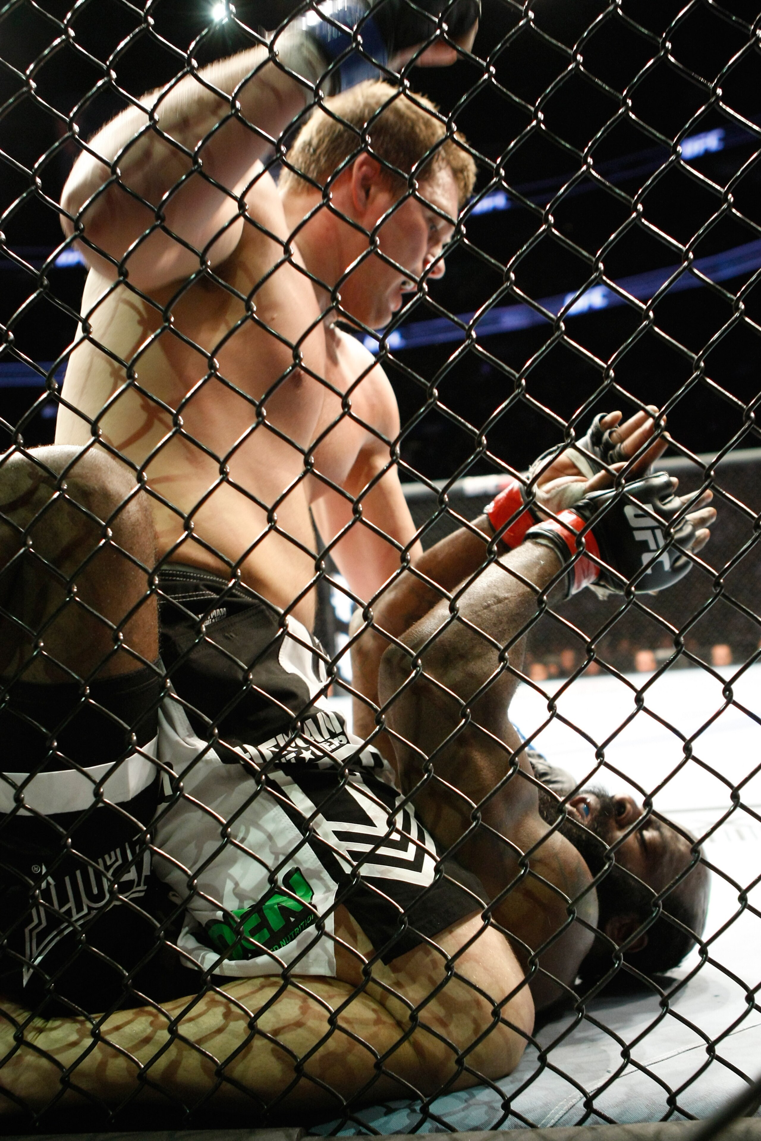 MONTREAL- MAY 8: Matt Mitrione (top) punches Kimbo Slice in their heavyweight bout at UFC 113 at Bell Centre on May 8, 2010 in Montreal, Quebec, Canada. Matt Mitrione won the bout by KO. (Photo by Richard Wolowicz/Getty Images)