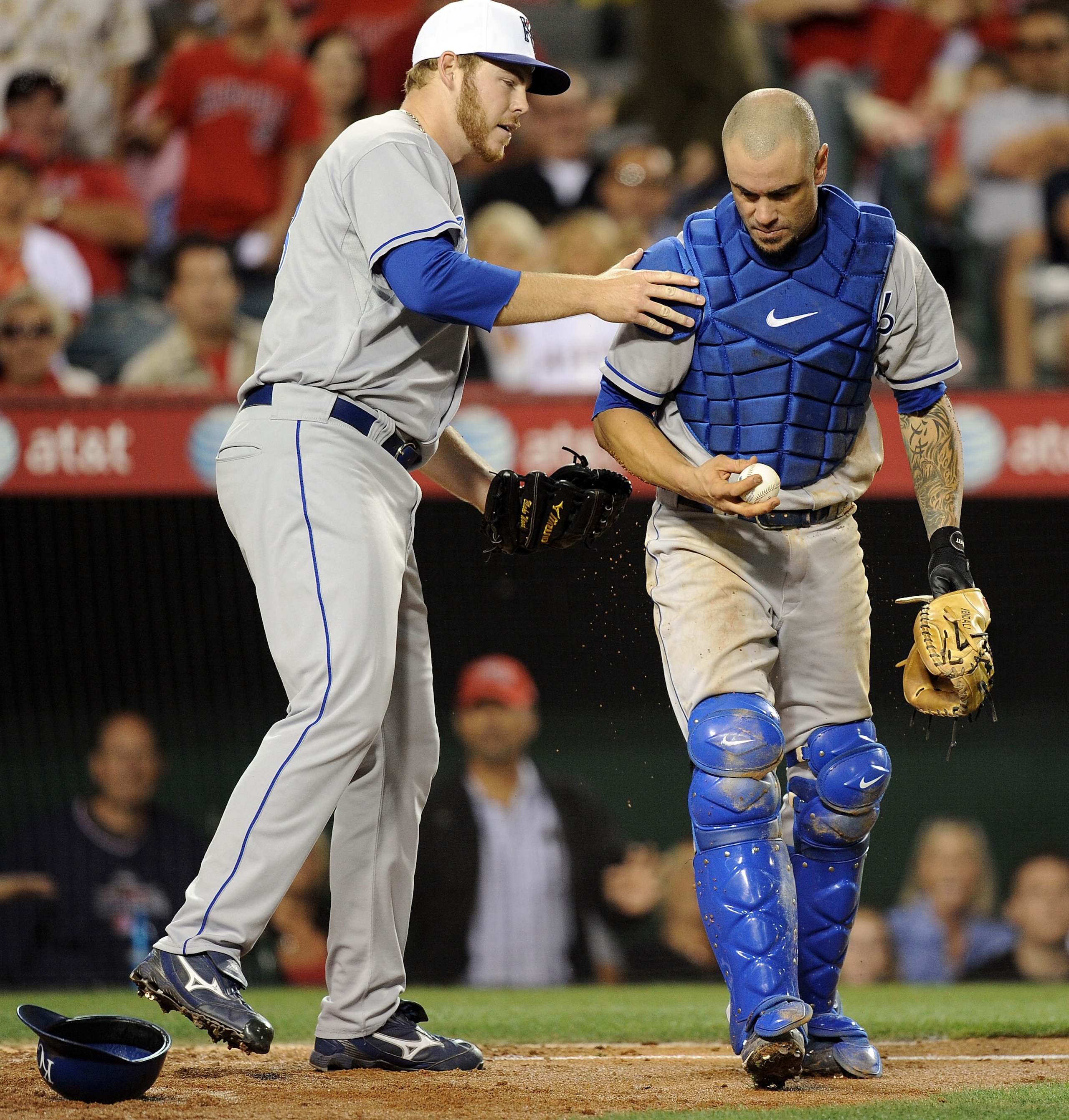 ANAHEIM, CA - JULY 02:  Blake Wood #38 of the Kansas City Royals celebrates the third out of Torii Hunter #48 of the Los Angeles Angels attempting to steal home after a wild pitch with Jason Kendall #18 during the eighth inning at Angel Stadium on July 2,