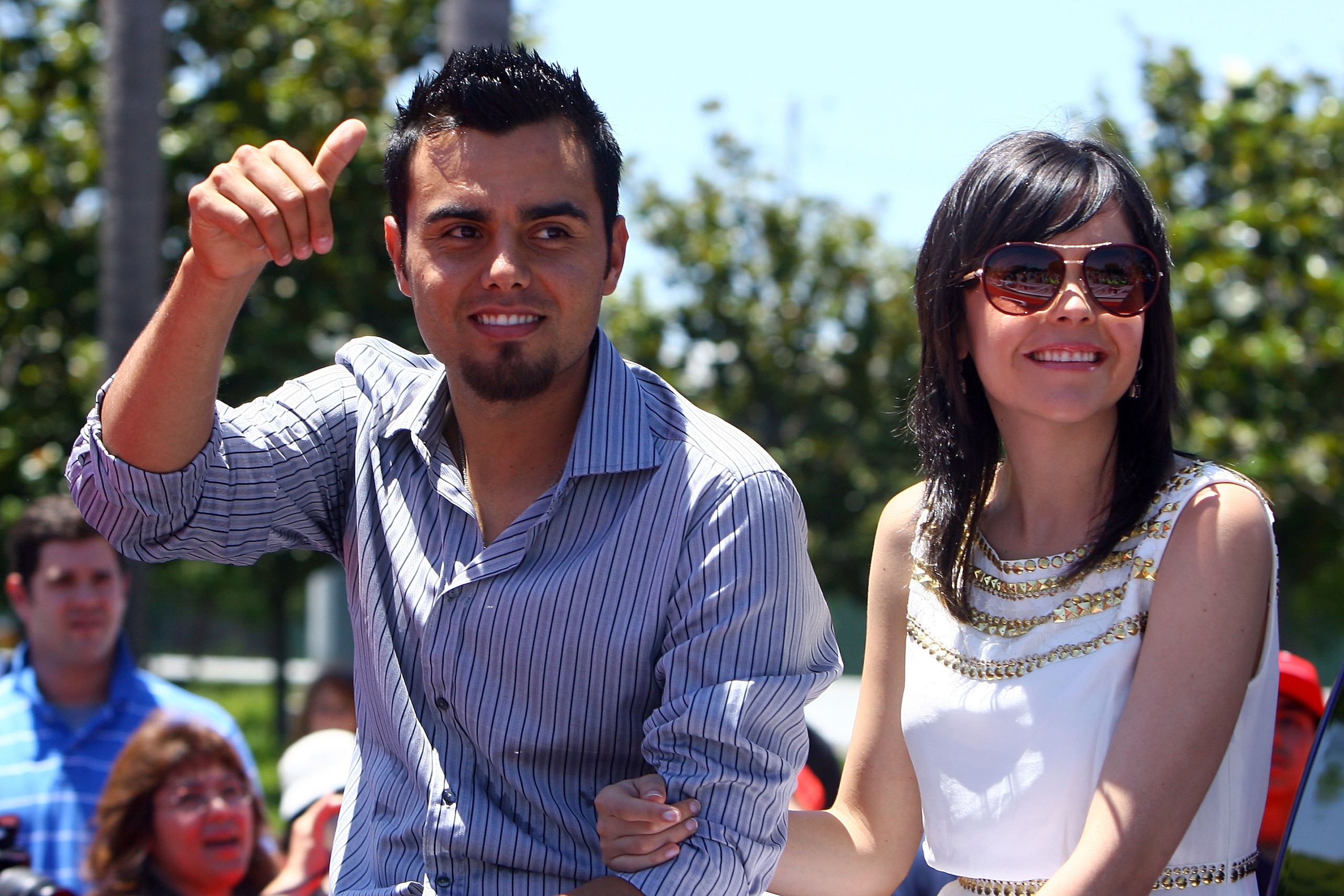 ANAHEIM, CA - JULY 13:  American League All-Star Joakim Soria #48 Kansas City Royals and wife Karla Soria wave to fans during the 6th Annual MLB All-Star Red Carpet Show outside Angel Stadium of Anaheim on July 13, 2010 in Anaheim, California.  (Photo by