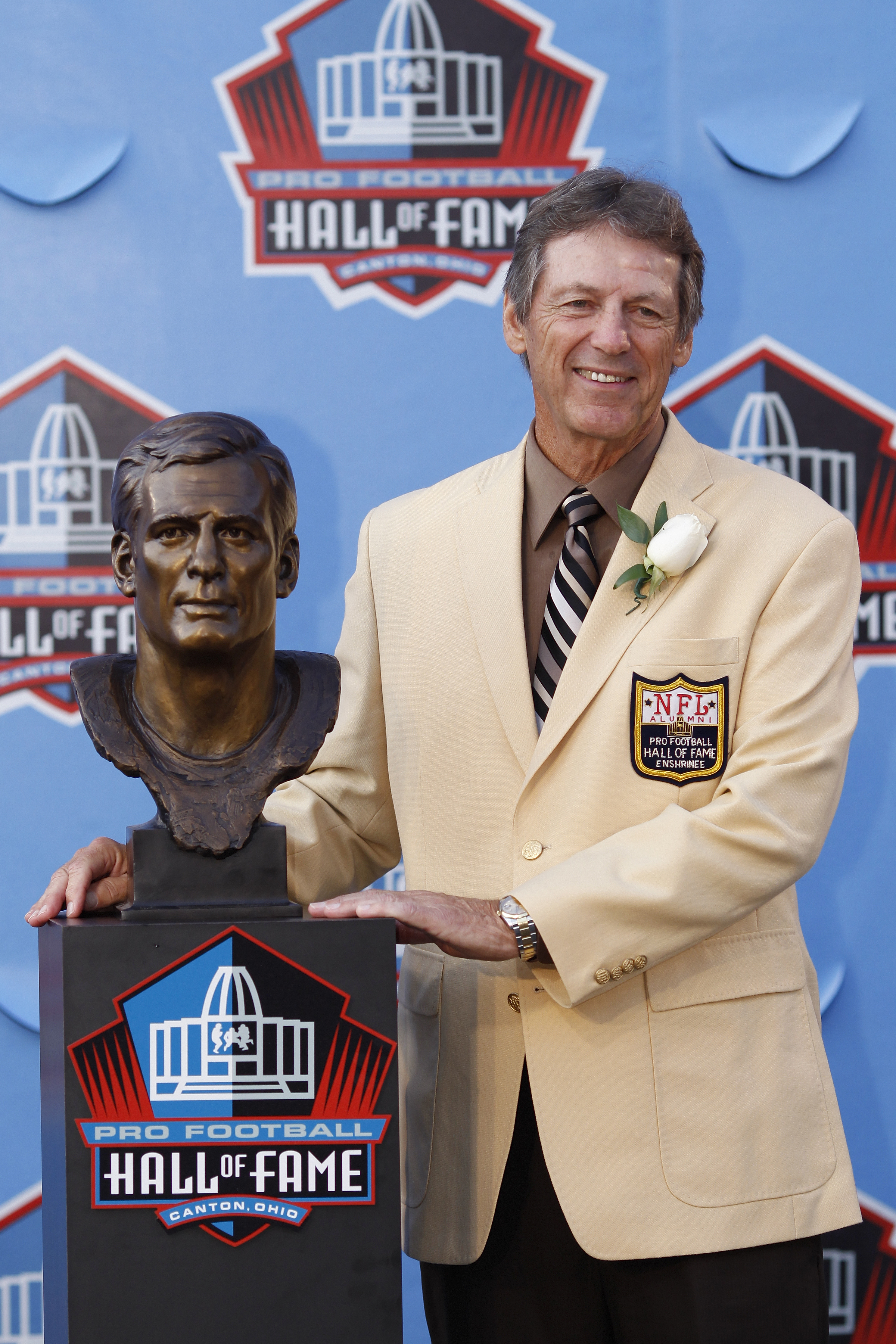 CANTON, OH - AUGUST 7: Dick LeBeau poses with his bust during the 2010 Pro Football Hall of Fame Enshrinement Ceremony at the Pro Football Hall of Fame Field at Fawcett Stadium on August 7, 2010 in Canton, Ohio. (Photo by Joe Robbins/Getty Images)