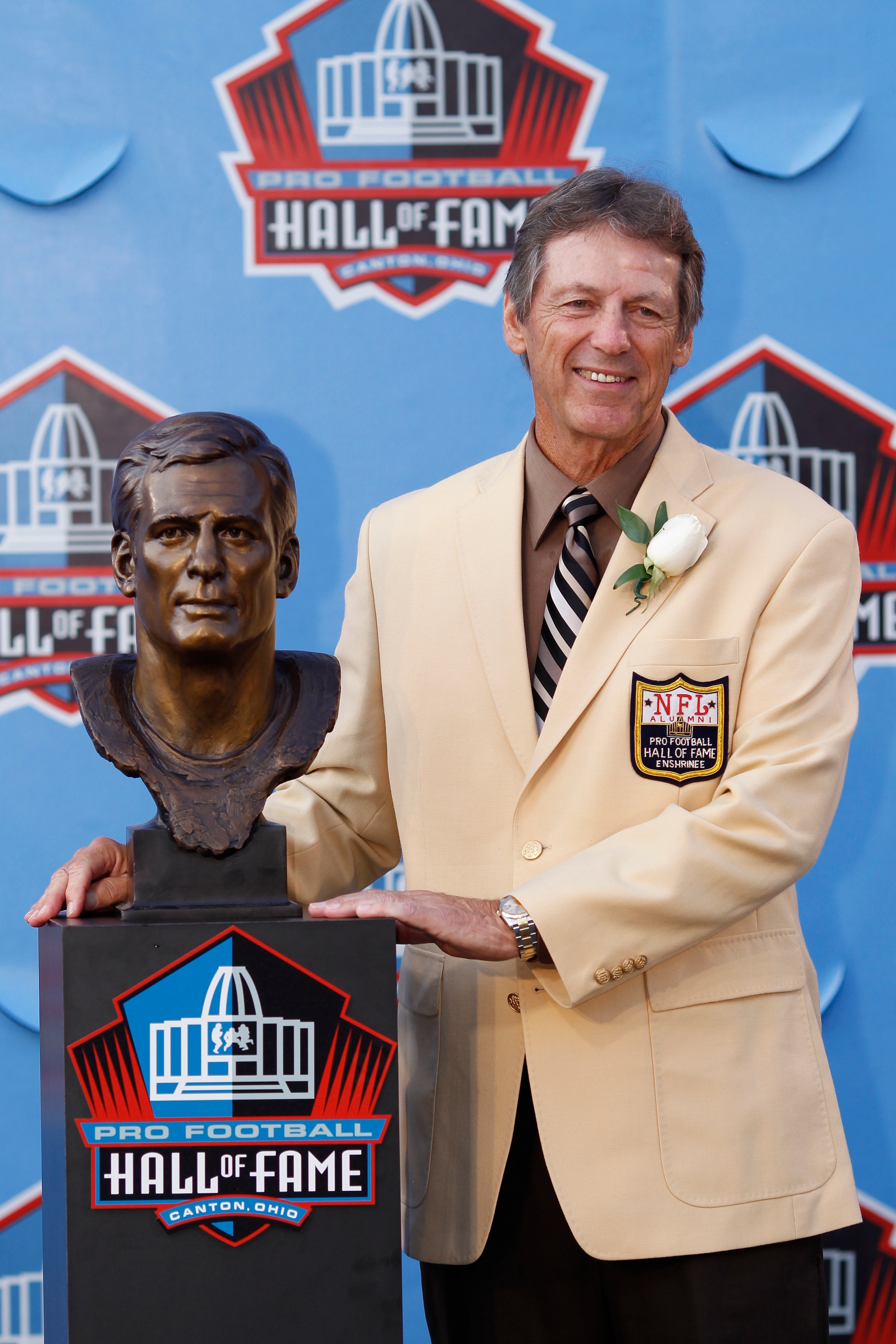 CANTON, OH - AUGUST 7: Dick LeBeau poses with his bust during the 2010 Pro Football Hall of Fame Enshrinement Ceremony at the Pro Football Hall of Fame Field at Fawcett Stadium on August 7, 2010 in Canton, Ohio. (Photo by Joe Robbins/Getty Images)