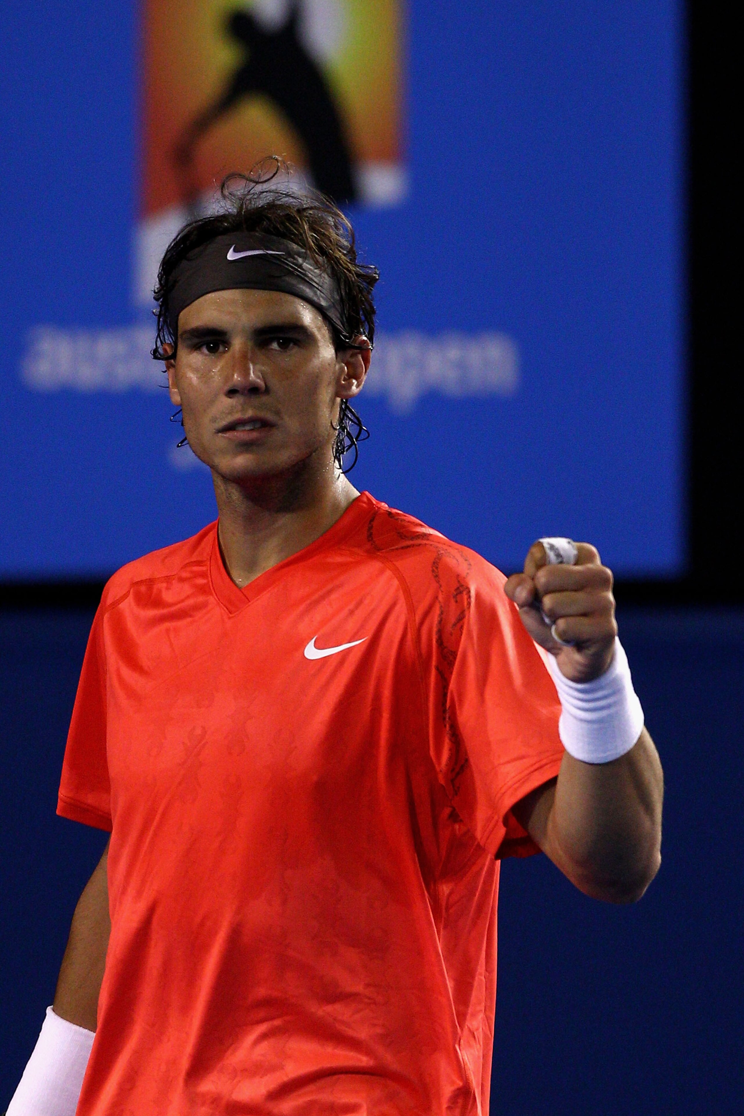 MELBOURNE, AUSTRALIA - JANUARY 24:  Rafael Nadal of Spain celebrates match point after winning his fourth round match against Marin Cilic of Croatia during day eight of the 2011 Australian Open at Melbourne Park on January 24, 2011 in Melbourne, Australia