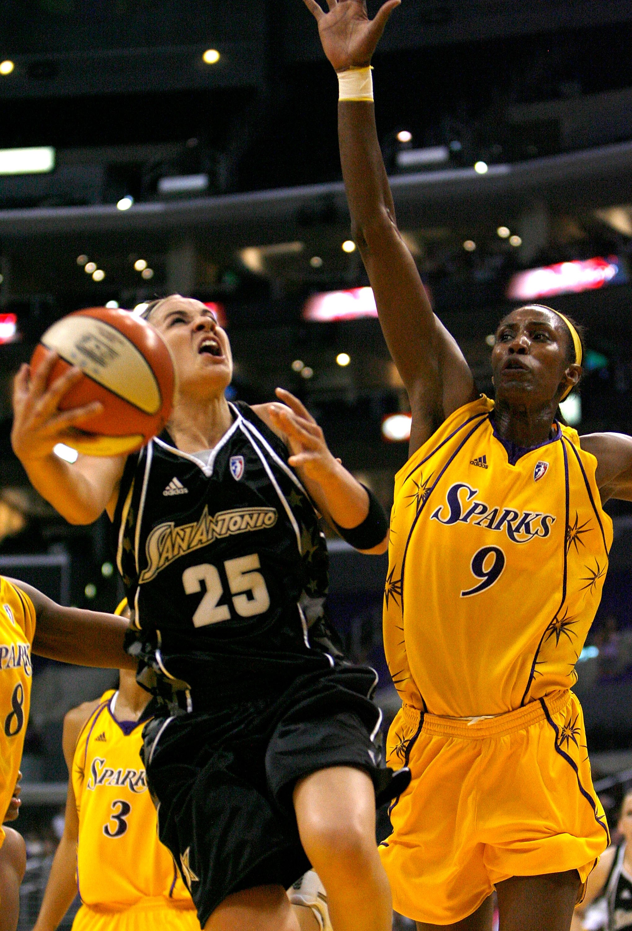 LOS ANGELES, CA - JULY 14:  Becky Hammon #25 of the San Antonio Silver Stars puts up a shot against Lisa Leslie #9 of the Los Angeles Sparks during the game on July 14, 2008 at the Staples Center in Los Angeles, California.  The Sparks beat the Silver Sta