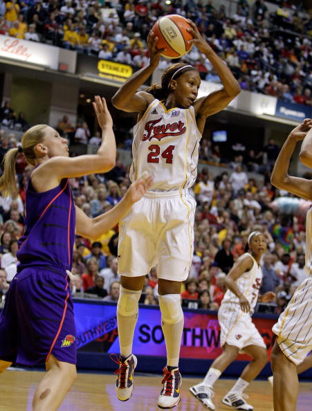 INDIANAPOLIS - OCTOBER 07:  Tamika Catchings #24 of the Indiana Fever grabs a rebound during the WNBA Finals game 4 against the Phoenix Mercury at Conseco Fieldhouse on October 7, 2009 in Indianapolis, Indiana.   NOTE TO USER: User expressly acknowledges