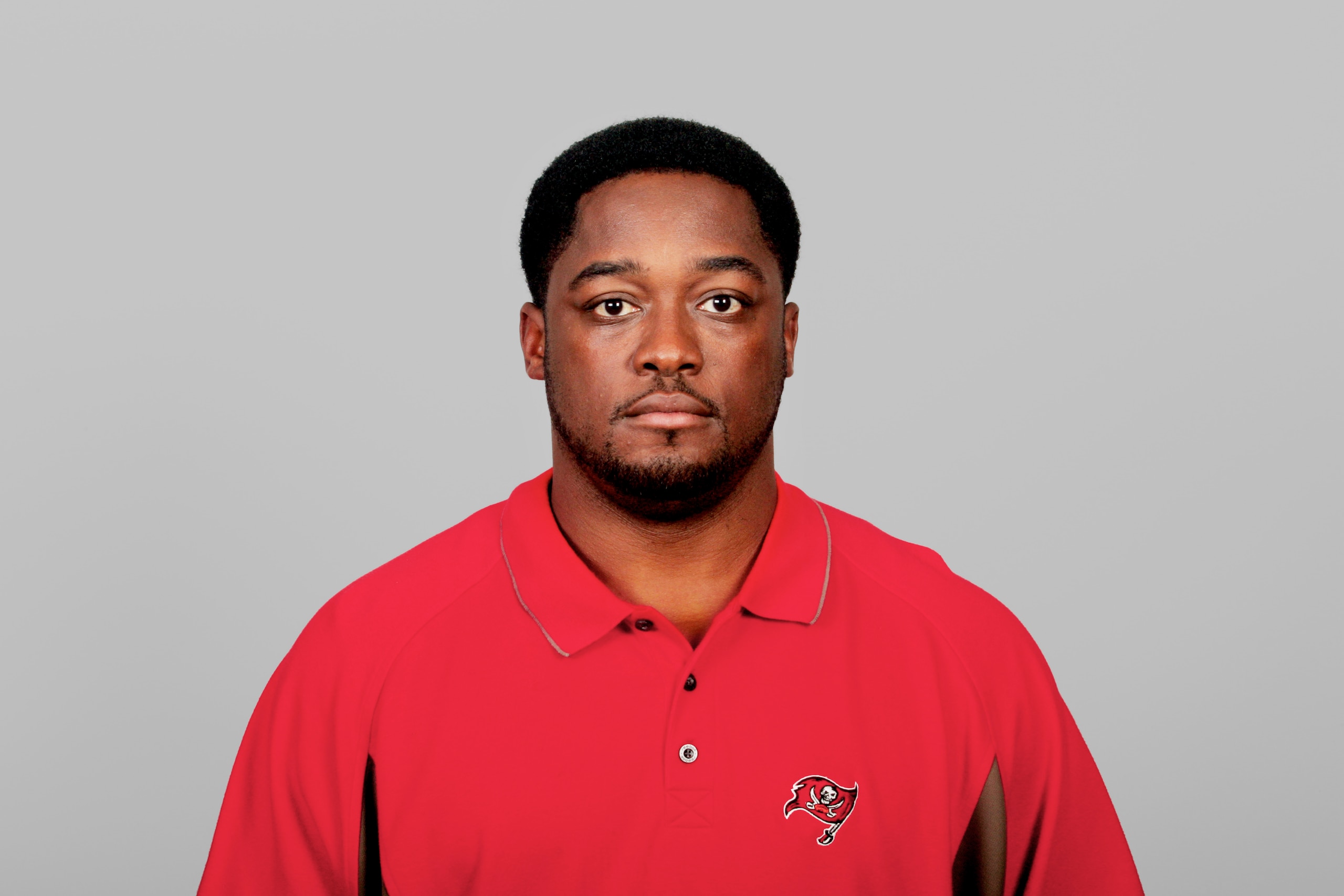TAMPA, FL - 2005:  Mike Tomlin of the Tampa Bay Buccaneers poses for his 2005 NFL headshot at photo day in Tampa, Florida.  (Photo by Getty Images)