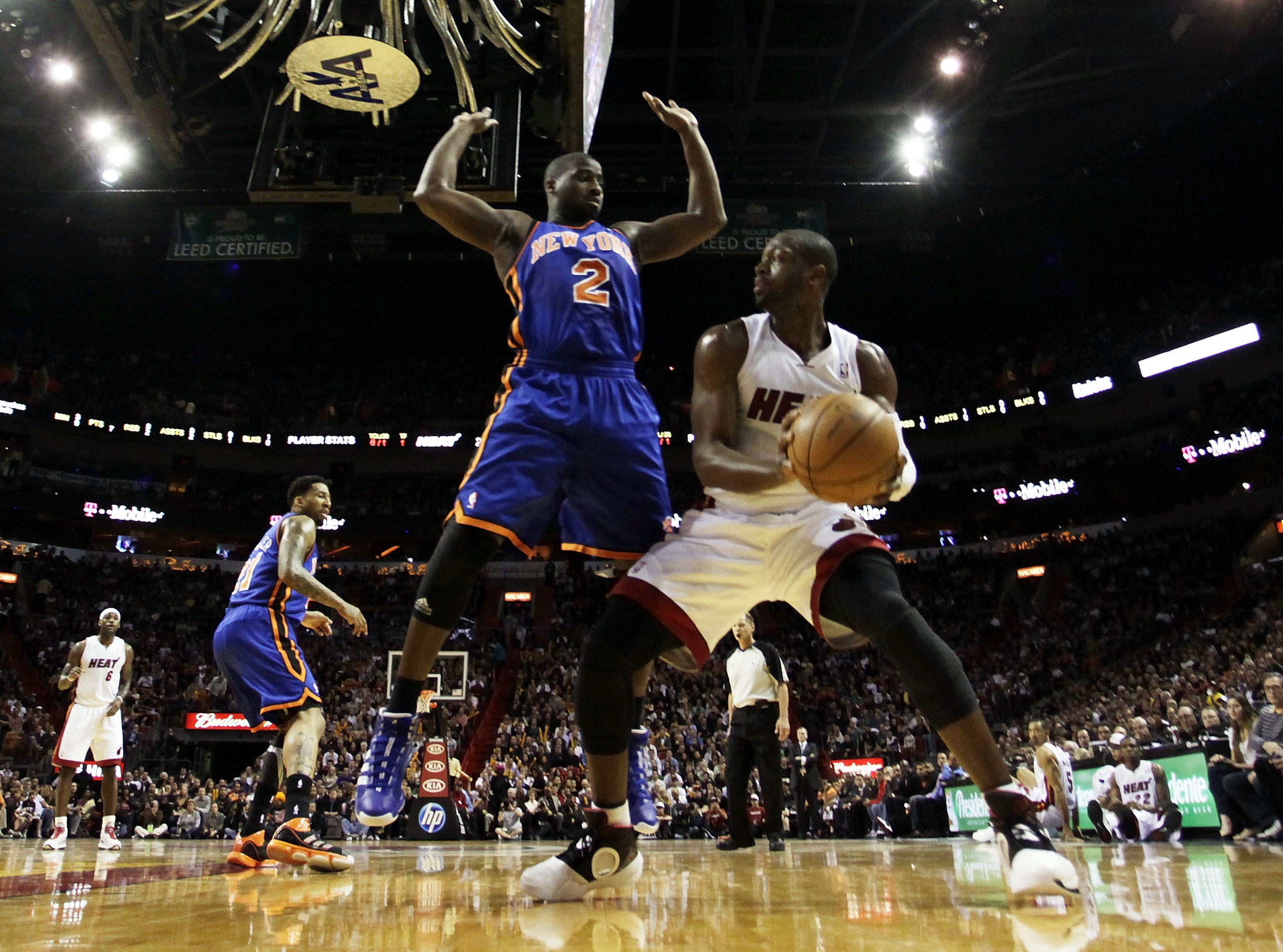 MIAMI - DECEMBER 28:  Guard Dwyane Wade #3 of the Miami Heat drives against guard Raymond felton #2 of the New York Knicks at American Airlines Arena on December 28, 2010 in Miami, Florida. Wade had 40 points as the Heat defeated the Knicks 106-98.  (Phot