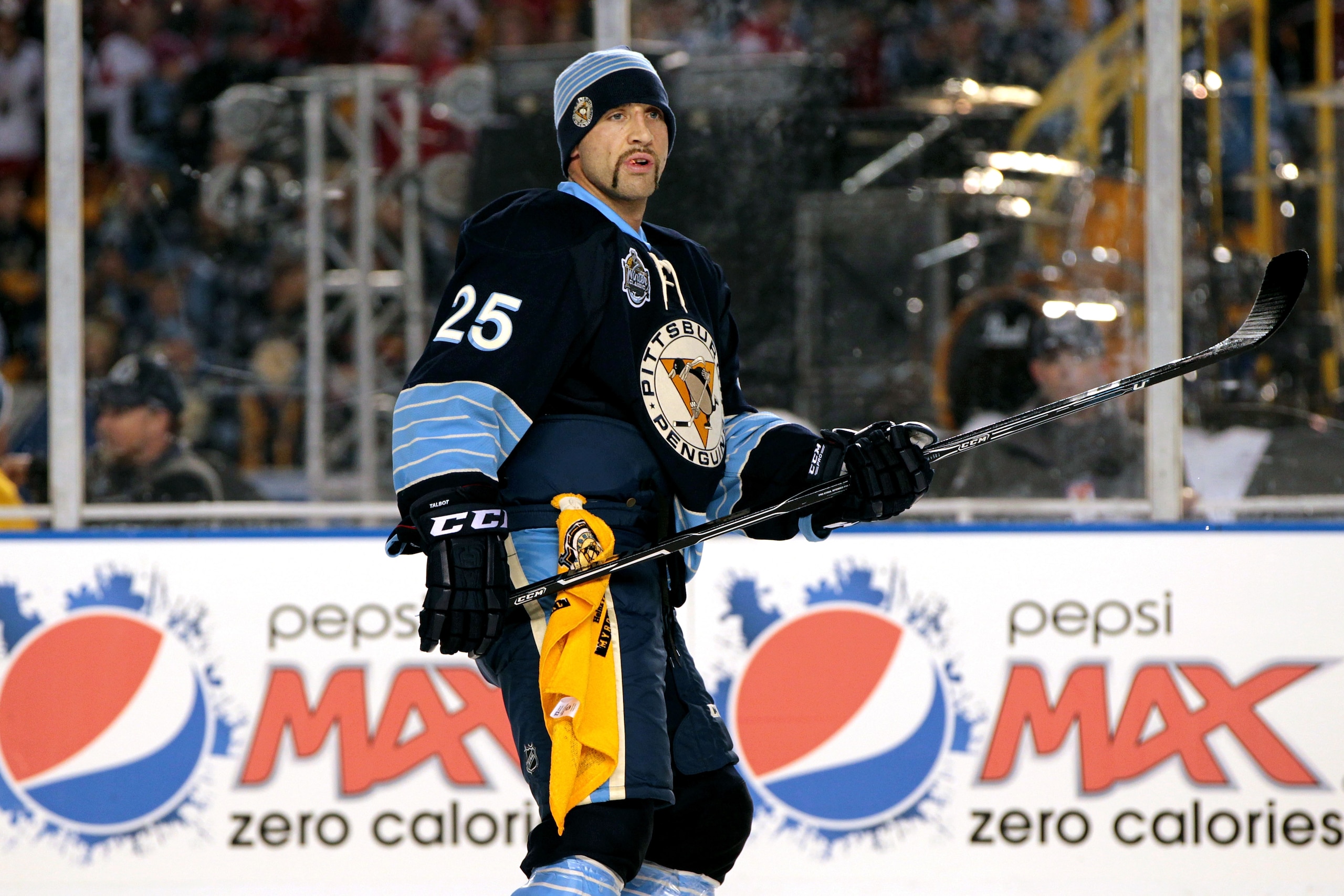 PITTSBURGH, PA - JANUARY 01:  Maxime Talbot #25 looks on during warm ups before the 2011 NHL Bridgestone Winter Classic against the Washington Capitals at Heinz Field on January 1, 2011 in Pittsburgh, Pennsylvania. Washington won 3-1. (Photo by Jamie Squi