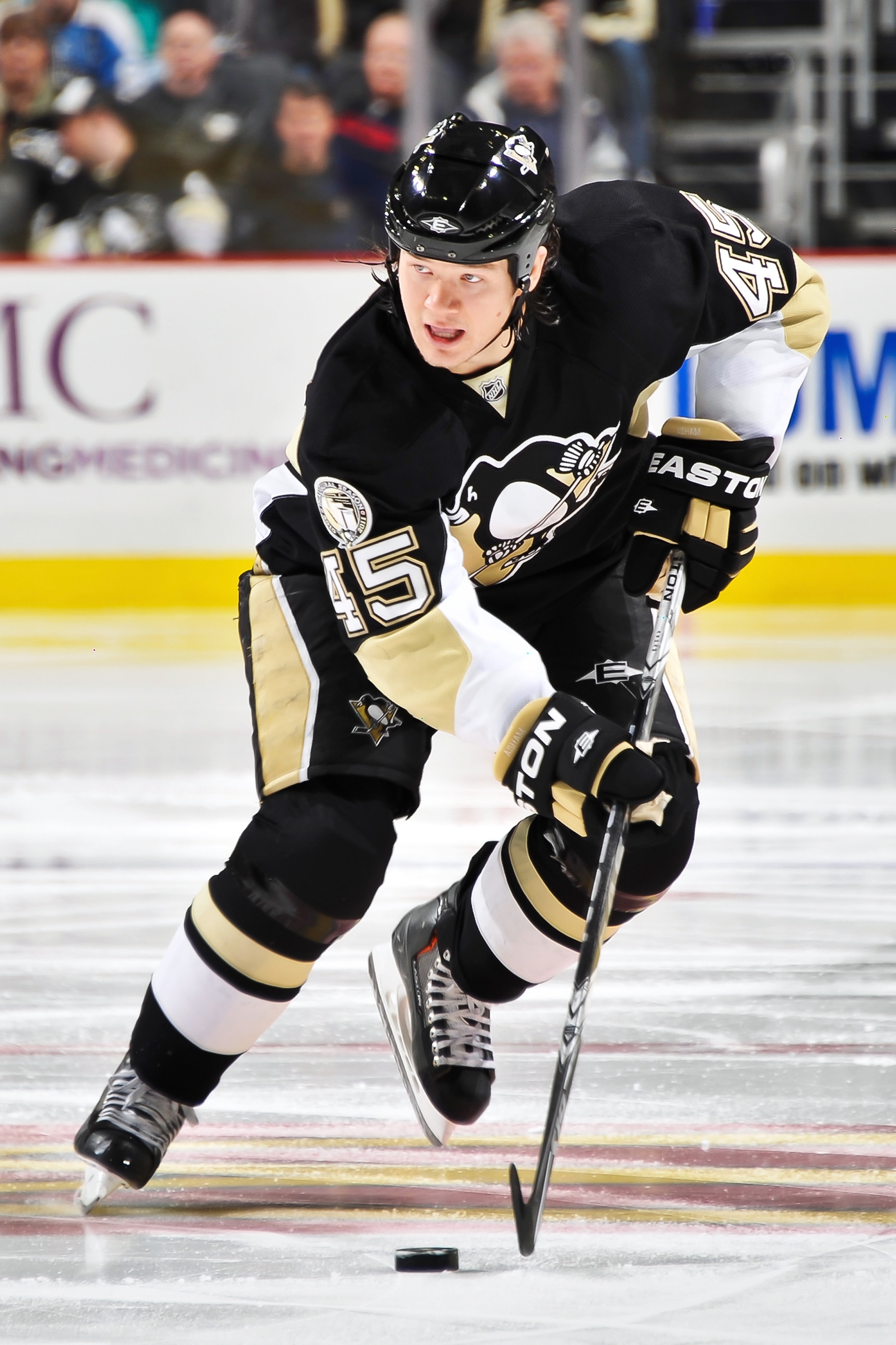 PITTSBURGH - NOVEMBER 19:  Arron Asham #45 of the Pittsburgh Penguins skates with the puck against the Carolina Hurricanes on November 19, 2010 at Consol Energy Center in Pittsburgh, Pennsylvania.  (Photo by Jamie Sabau/Getty Images)