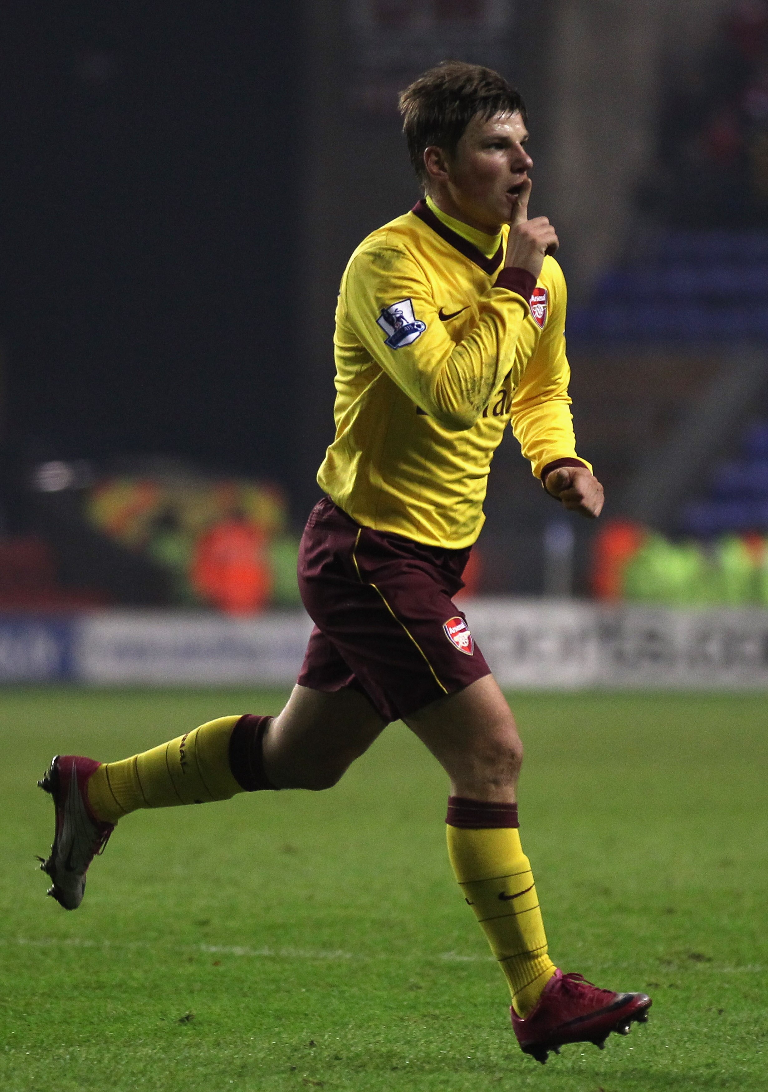 WIGAN, ENGLAND - DECEMBER 29:  Andrey Arshavin of Arsenal celebrates after scoring his goal during the Barclays Premier League match between Wigan Athletic and Arsenal at DW Stadium on December 29, 2010 in Wigan, England.  (Photo by Alex Livesey/Getty Ima