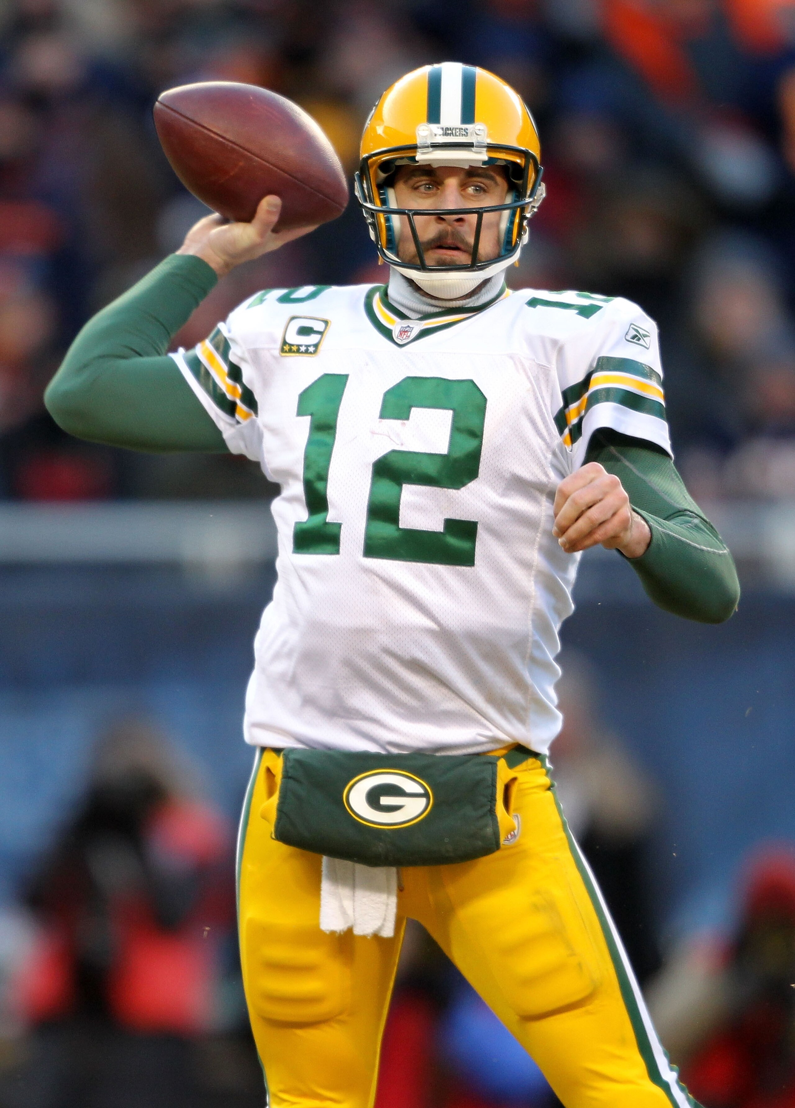 CHICAGO, IL - JANUARY 23:  Quarterback Aaron Rodgers #12 of the Green Bay Packers throws a pass in the second half against the Chicago Bears in the NFC Championship Game at Soldier Field on January 23, 2011 in Chicago, Illinois.  (Photo by Andy Lyons/Gett