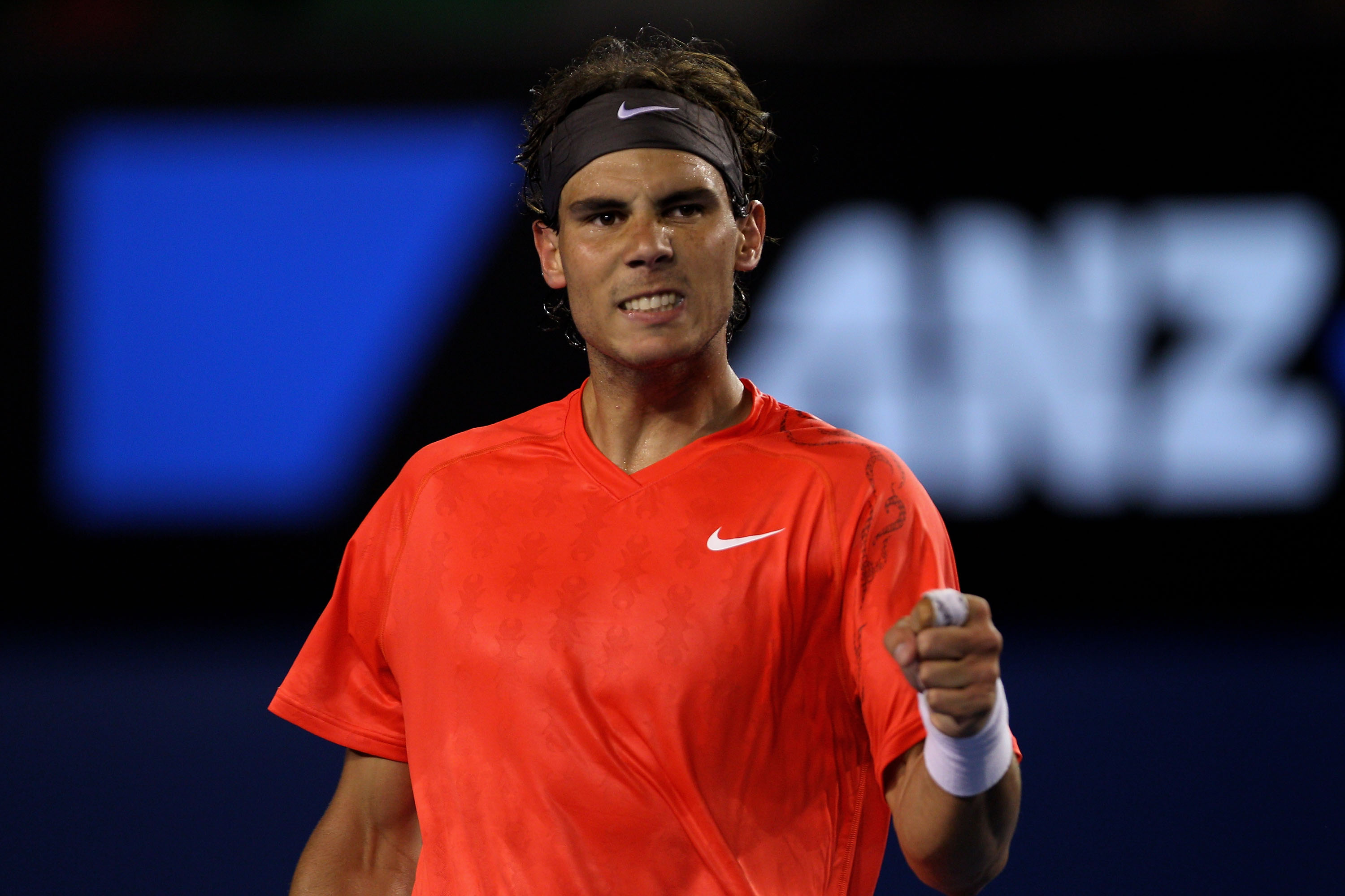 MELBOURNE, AUSTRALIA - JANUARY 24:  Rafael Nadal of Spain celebrates match point after winning his fourth round match against Marin Cilic of Croatia during day eight of the 2011 Australian Open at Melbourne Park on January 24, 2011 in Melbourne, Australia
