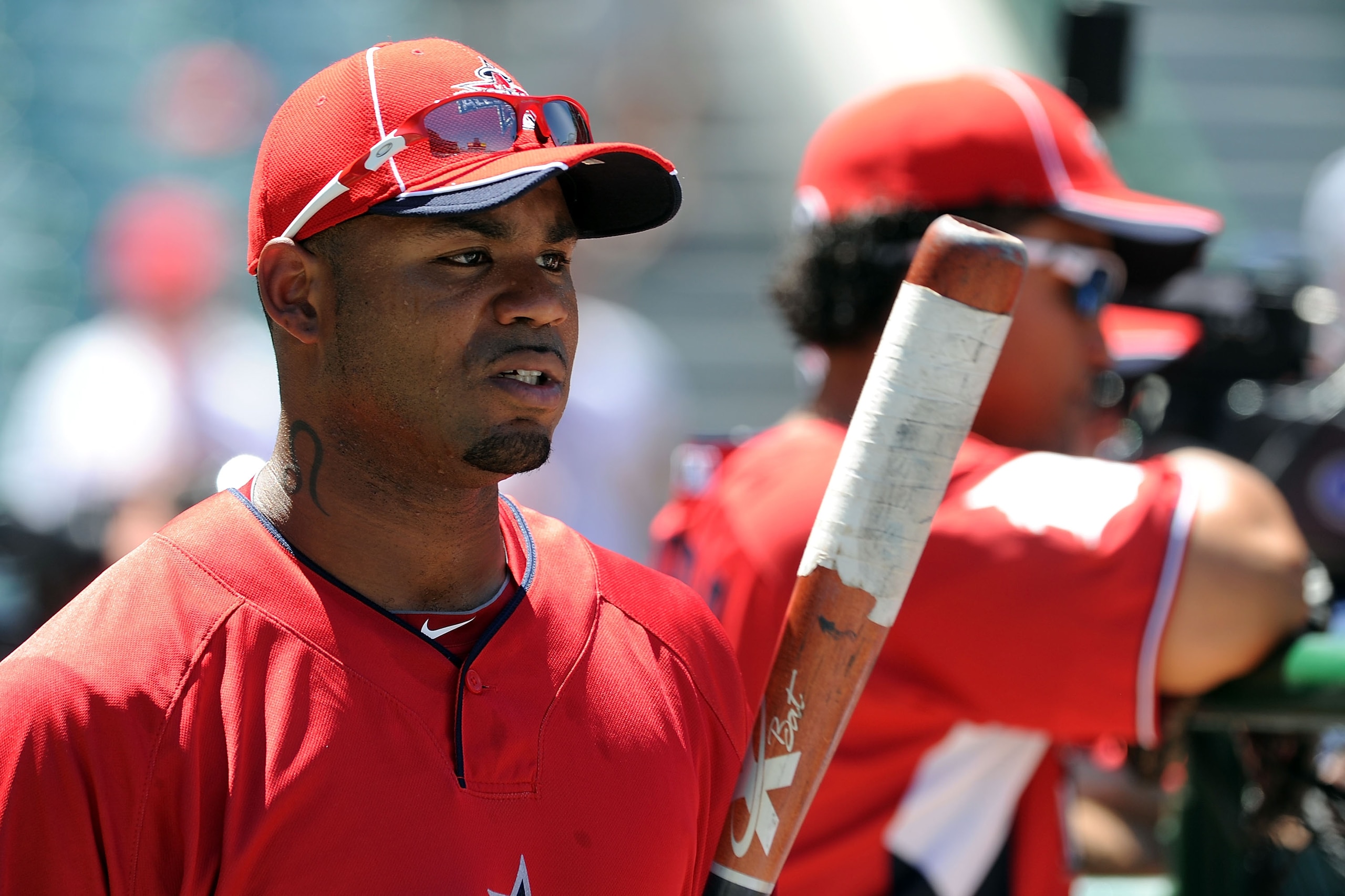 ANAHEIM, CA - JULY 13:  American League All-Star Carl Crawford #13 of the Tampa Bay Rays looks on during the 81st MLB All-Star Game at Angel Stadium of Anaheim on July 13, 2010 in Anaheim, California.  (Photo by Michael Buckner/Getty Images)