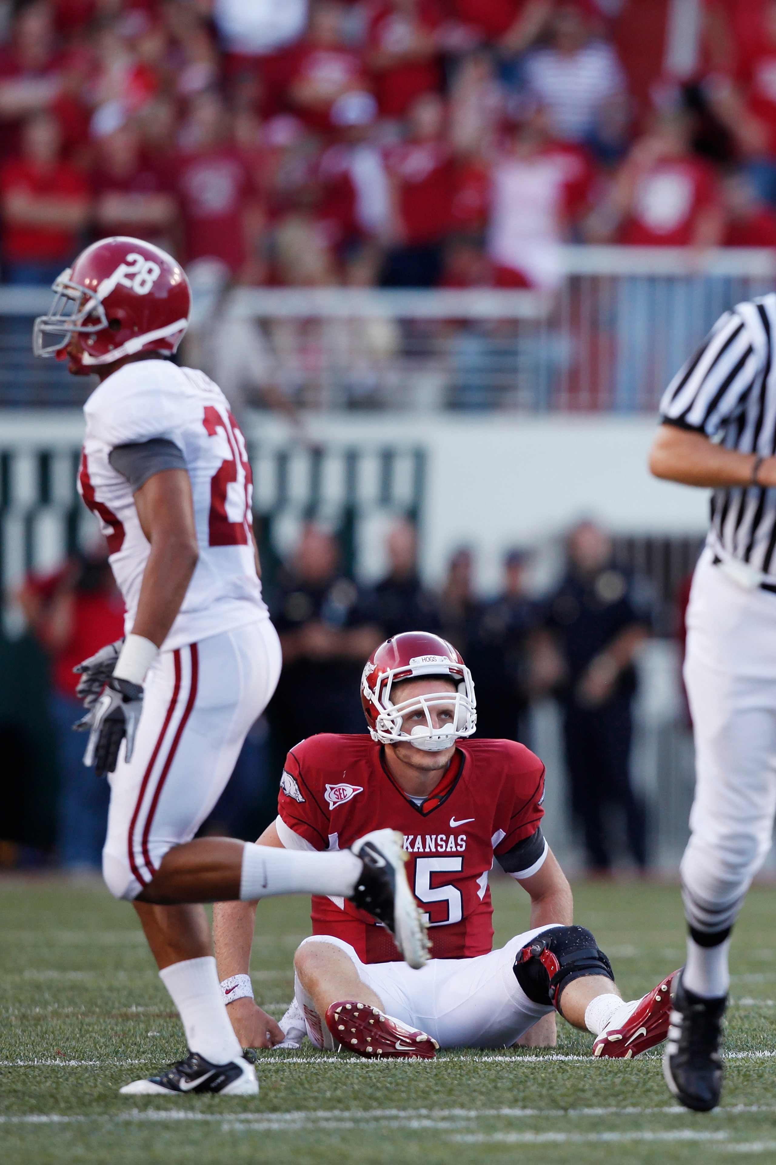 FAYETTEVILLE - SEPTEMBER 25: Ryan Mallett #15 of the Arkansas Razorbacks looks on after throwing an interception late in the game against the Alabama Crimson Tide at Donald W. Reynolds Razorback Stadium on September 25, 2010 in Fayetteville, Arkansas. Ala FAYETTEVILLE - SEPTEMBER 25: Ryan Mallett #15 of the Arkansas Razorbacks looks on after throwing an interception late in the game against the Alabama Crimson Tide at Donald W. Reynolds Razorback Stadium on September 25, 2010 in Fayetteville, Arkansas. Ala