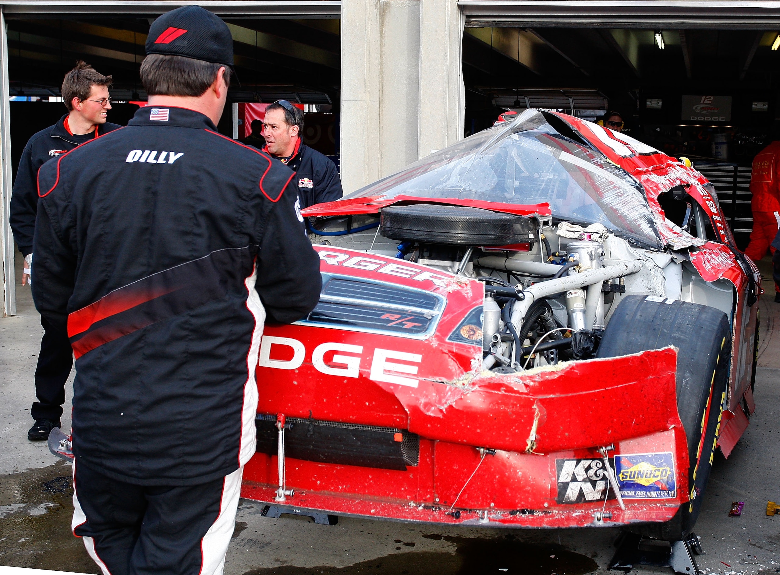 ATLANTA - MARCH 07:  The wrecked #12 Penske Dodge, driven by Brad Keselowski, sits in the garage after an incident on tack during the NASCAR Sprint Cup Series Kobalt Tools 500 at Atlanta Motor Speedway on March 7, 2010 in Hampton, Georgia.  (Photo by Geof