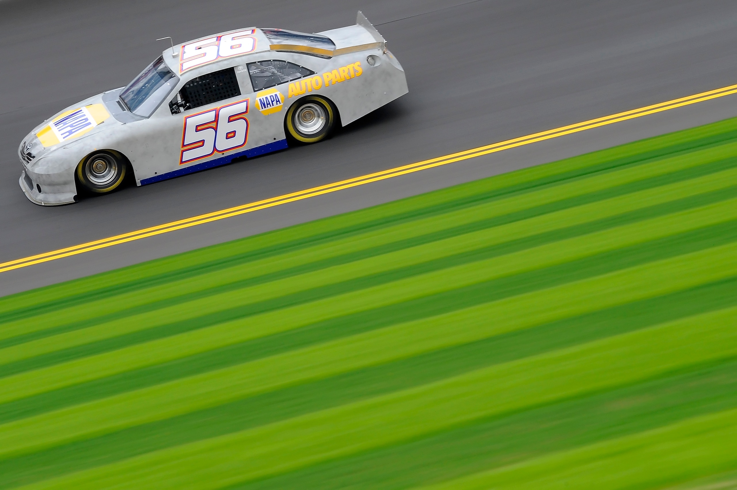 DAYTONA BEACH, FL - JANUARY 21:  Martin Truex Jr., driver of the #56 NAPA Auto Parts Toyota, races down the frontstretch during testing at Daytona International Speedway on January 21, 2011 in Daytona Beach, Florida.  (Photo by Jared C. Tilton/Getty Image