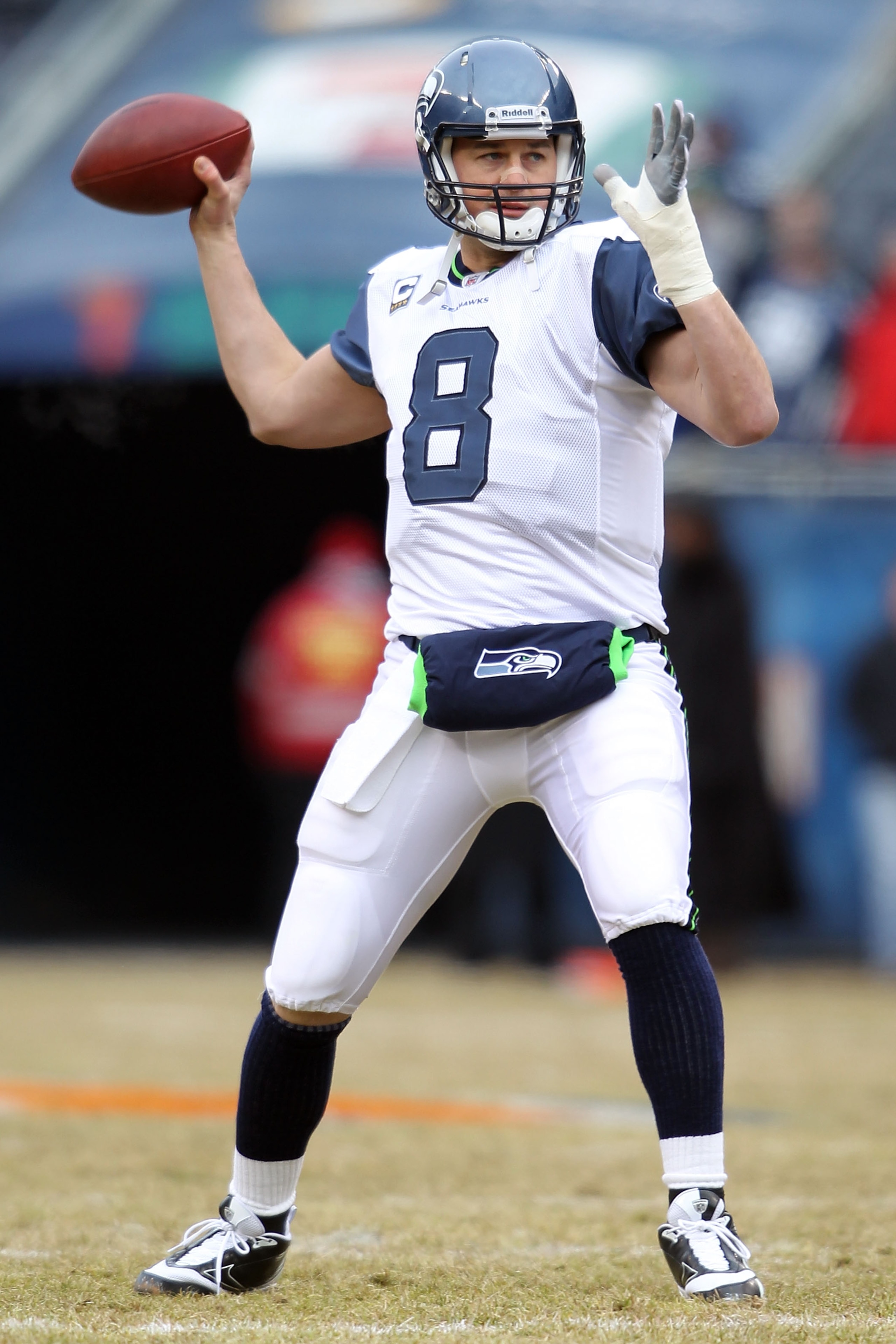 CHICAGO, IL - JANUARY 16:  Quarterback Matt Hasselbeck #8 of the Seattle Seahawks looks to throw the ball during pregame before taking on the Chicago Bears in the 2011 NFC divisional playoff game at Soldier Field on January 16, 2011 in Chicago, Illinois.