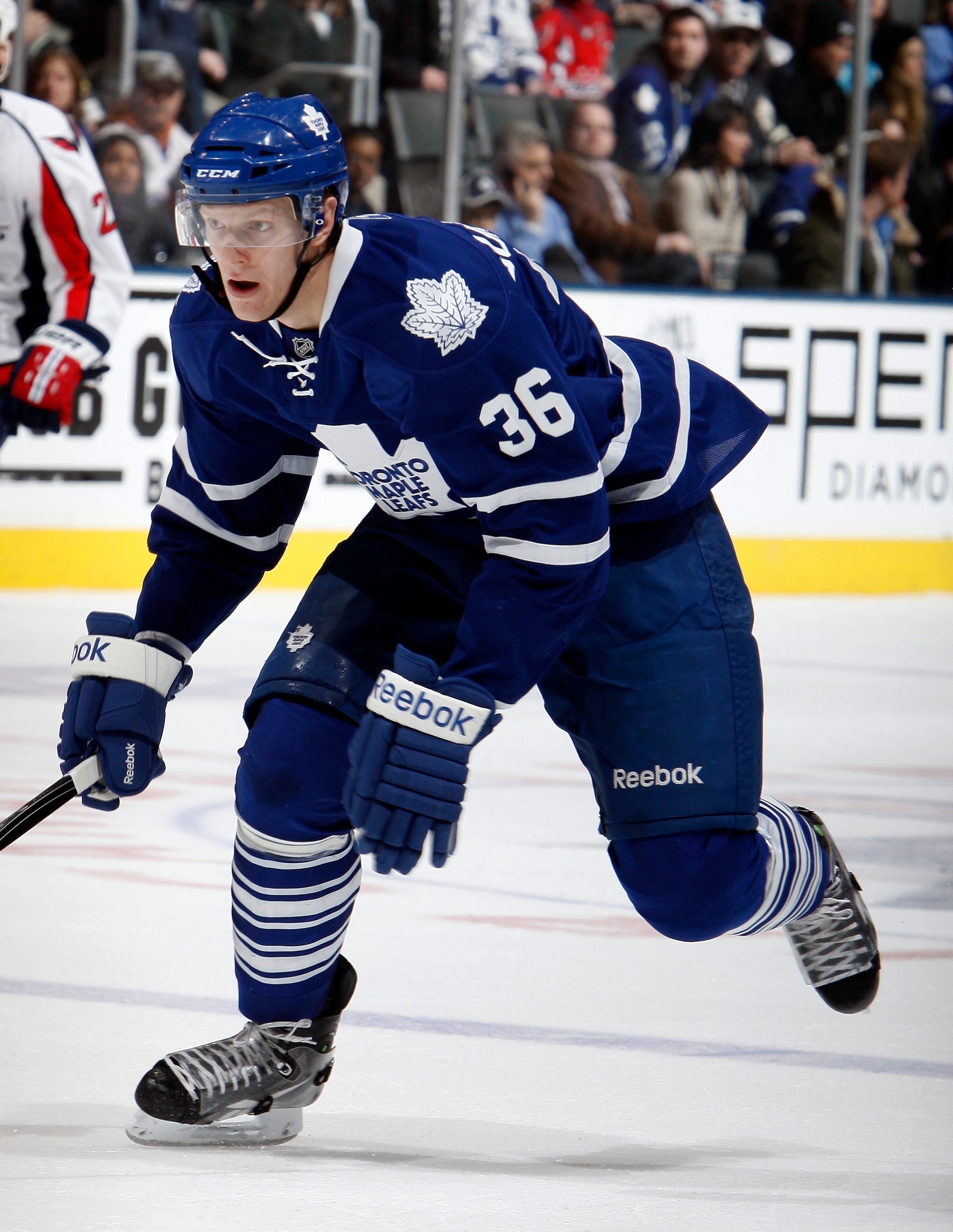 TORONTO, CANADA - JANUARY 22:  Carl Gunnarsson #36 of the Toronto Maple Leafs skates up the ice during game action at the Air Canada Centre against the Washington Capitals January 22, 2011 in Toronto, Ontario, Canada. (Photo by Abelimages/Getty Images)