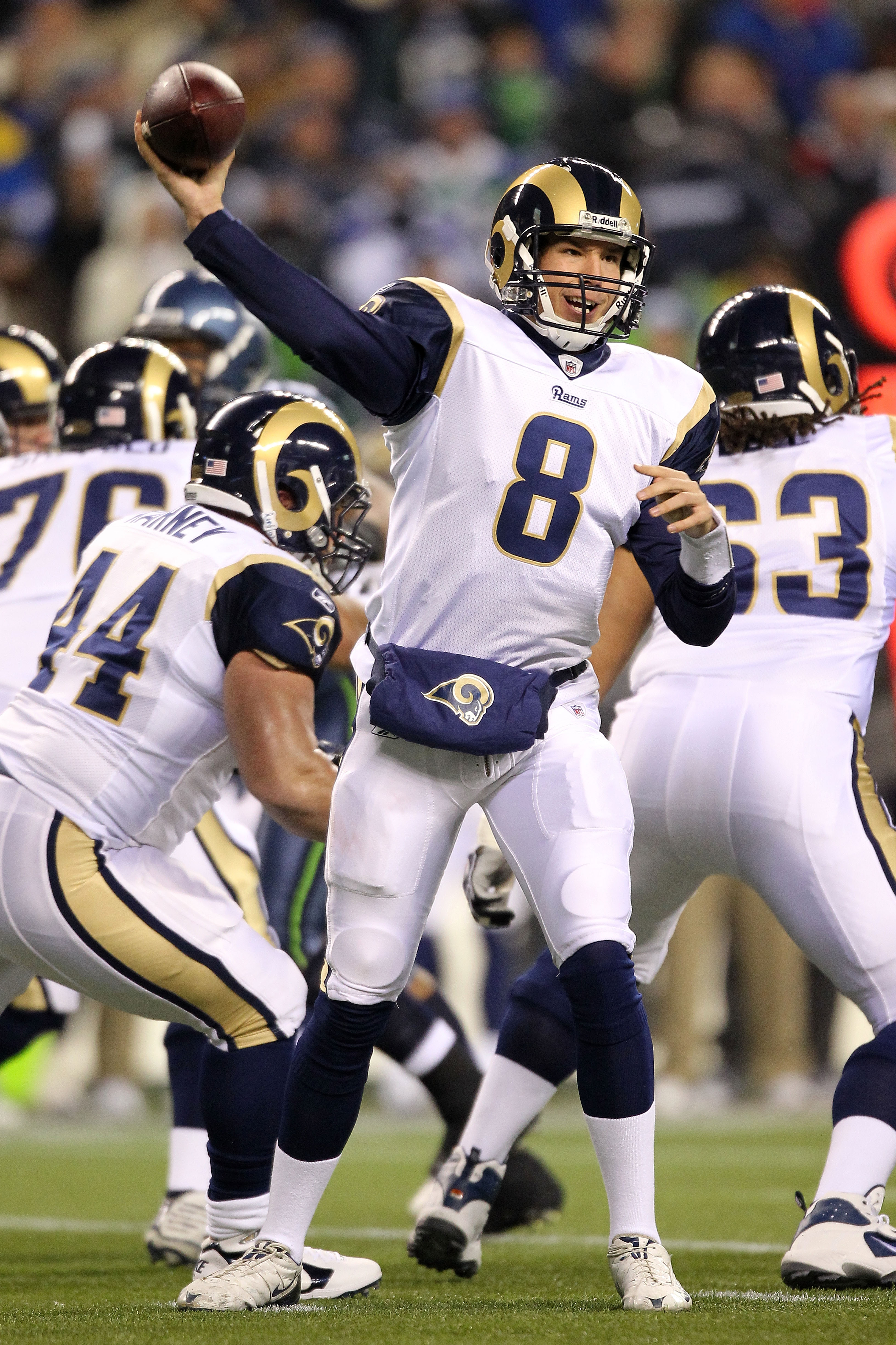 SEATTLE, WA - JANUARY 02:  Quarterback Sam Bradford #8 of the St. Louis Rams looks to pass against the Seattle Seahawks during their game at Qwest Field on January 2, 2011 in Seattle, Washington.  (Photo by Otto Greule Jr/Getty Images)