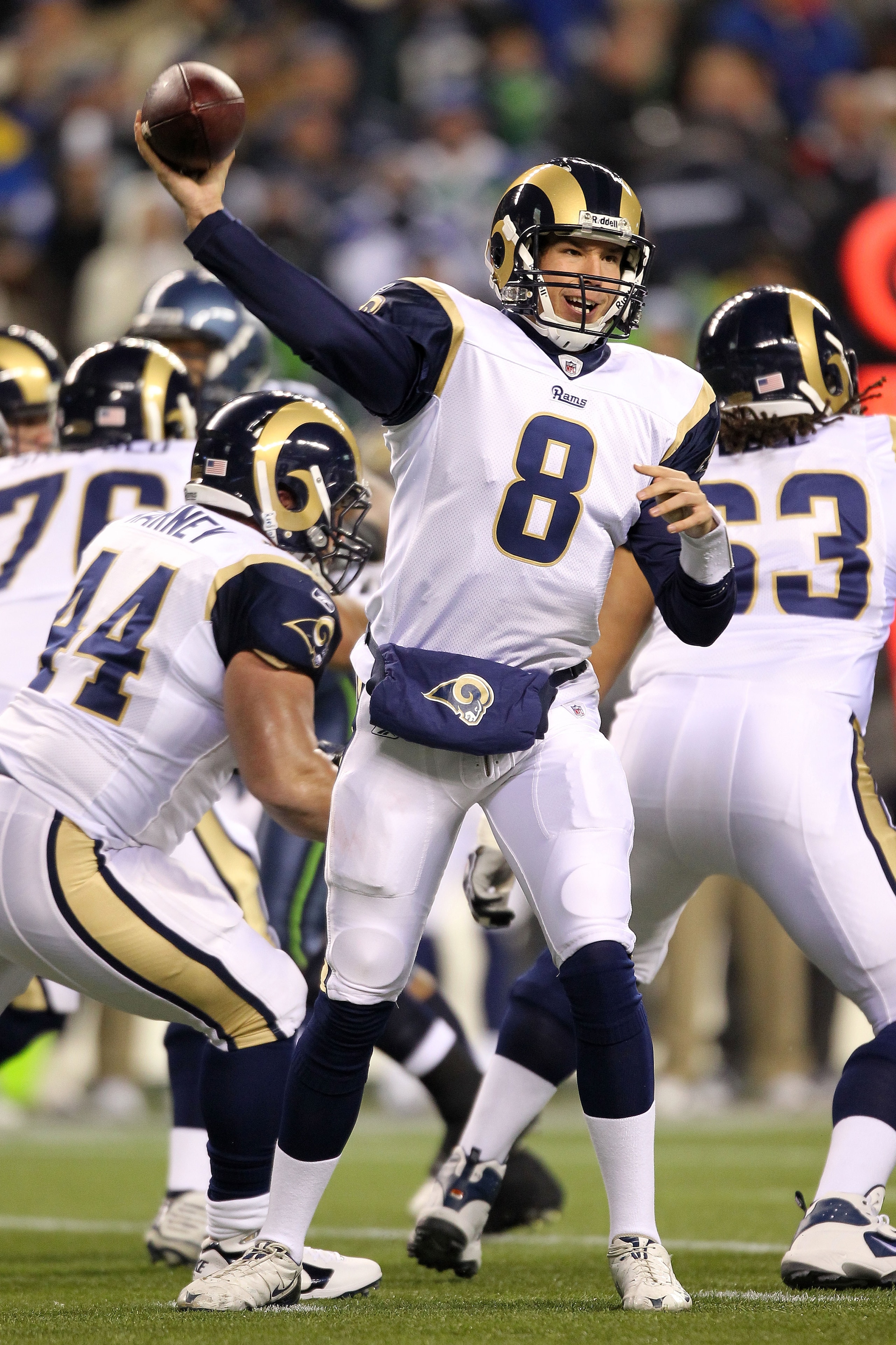 SEATTLE, WA - JANUARY 02:  Quarterback Sam Bradford #8 of the St. Louis Rams looks to pass against the Seattle Seahawks during their game at Qwest Field on January 2, 2011 in Seattle, Washington.  (Photo by Otto Greule Jr/Getty Images)