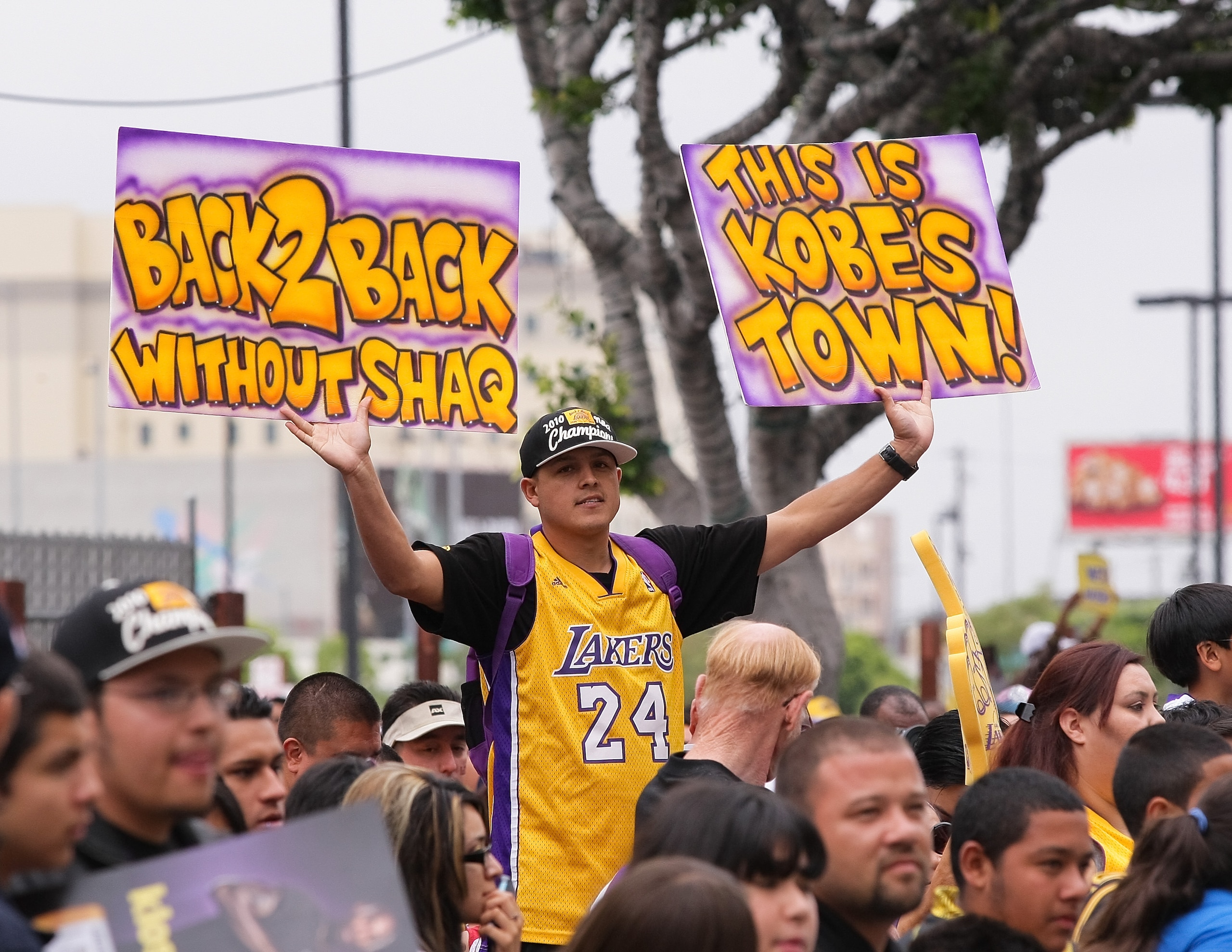 LOS ANGELES, CA - JUNE 21:  Fans display their signage for the Los Angeles Lakers during their victory parade for the the NBA basketball champion team on June 21, 2010 in Los Angeles, California. The Lakers beat the Boston Celtics 87-79 in 7 games for the