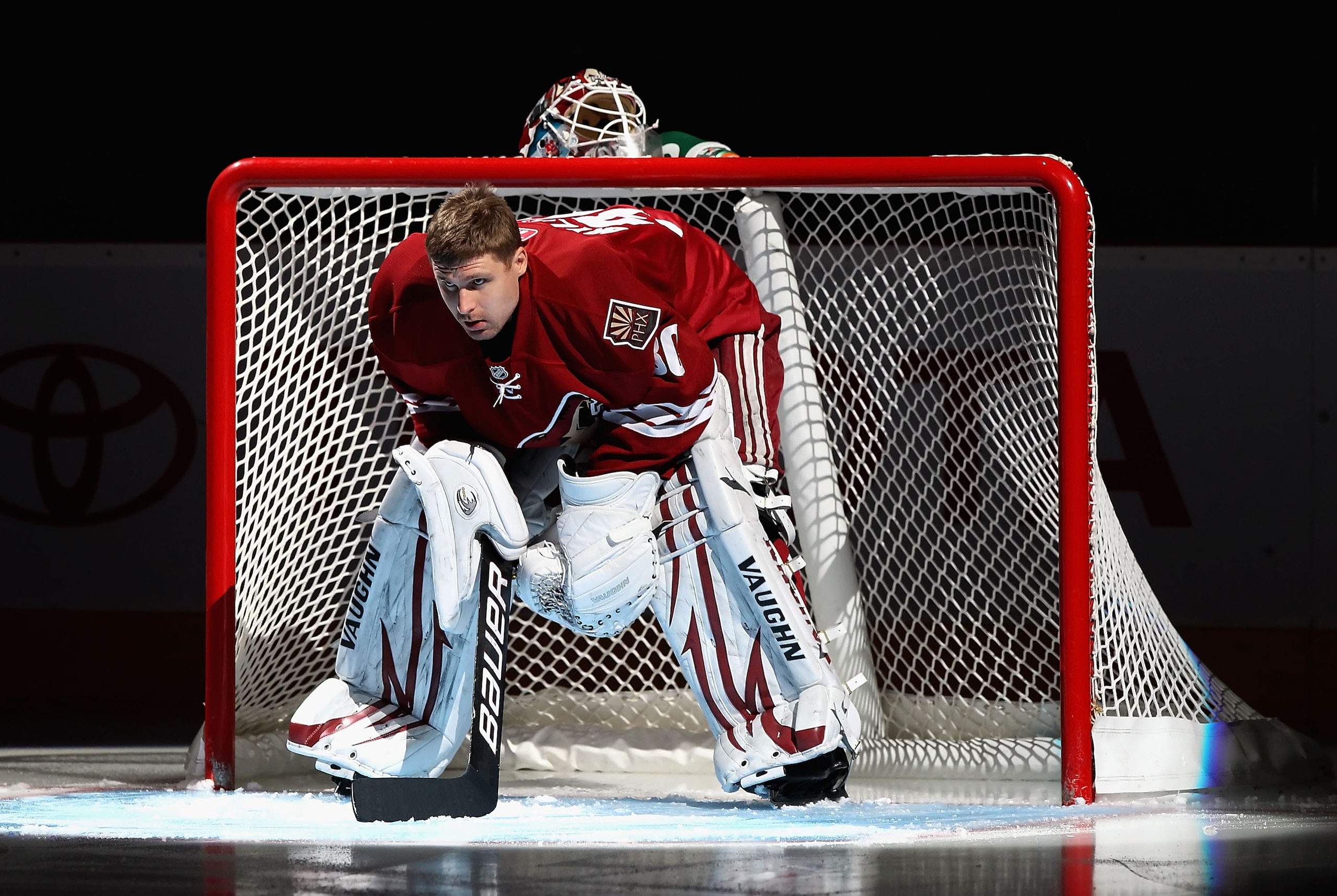 GLENDALE, AZ - JANUARY 22:  Goaltender Ilya Bryzgalov #30 of the Phoenix Coyotes is introduced before the NHL game against the Los Angeles Kings at Jobing.com Arena on January 22, 2011 in Glendale, Arizona.  The Kings defeated the Coyotes 4-3. (Photo by C