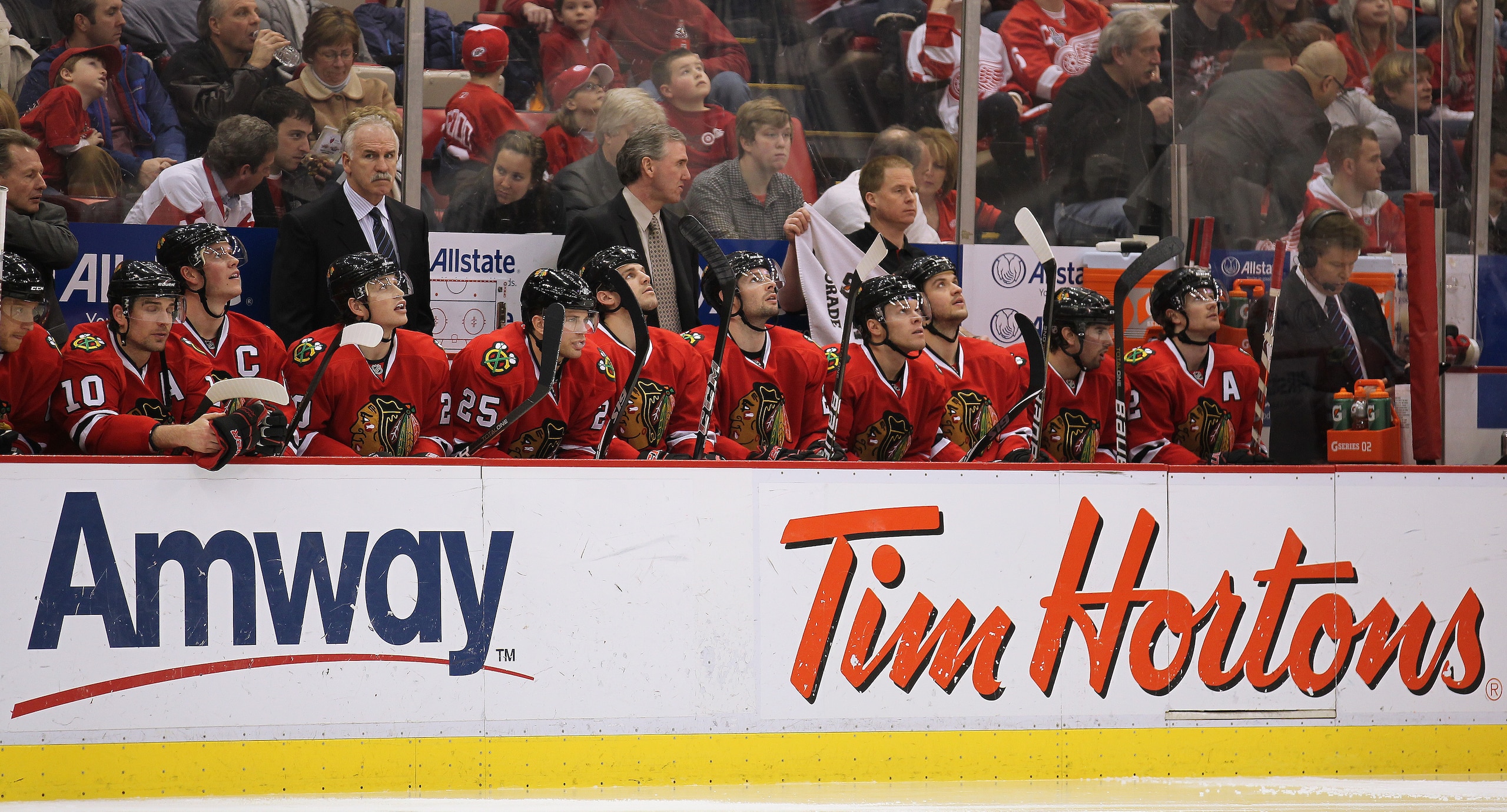 DETROIT, MI - JANUARY 22:  Head coach Joel Quenneville of the Chicago Black Hawks stands on the bench in a game against the Detroit Red Wings on January 22, 2011 at the Joe Louis Arena in Detroit, Michigan. The Hawks defeated the Wings 4-1. (Photo by Clau