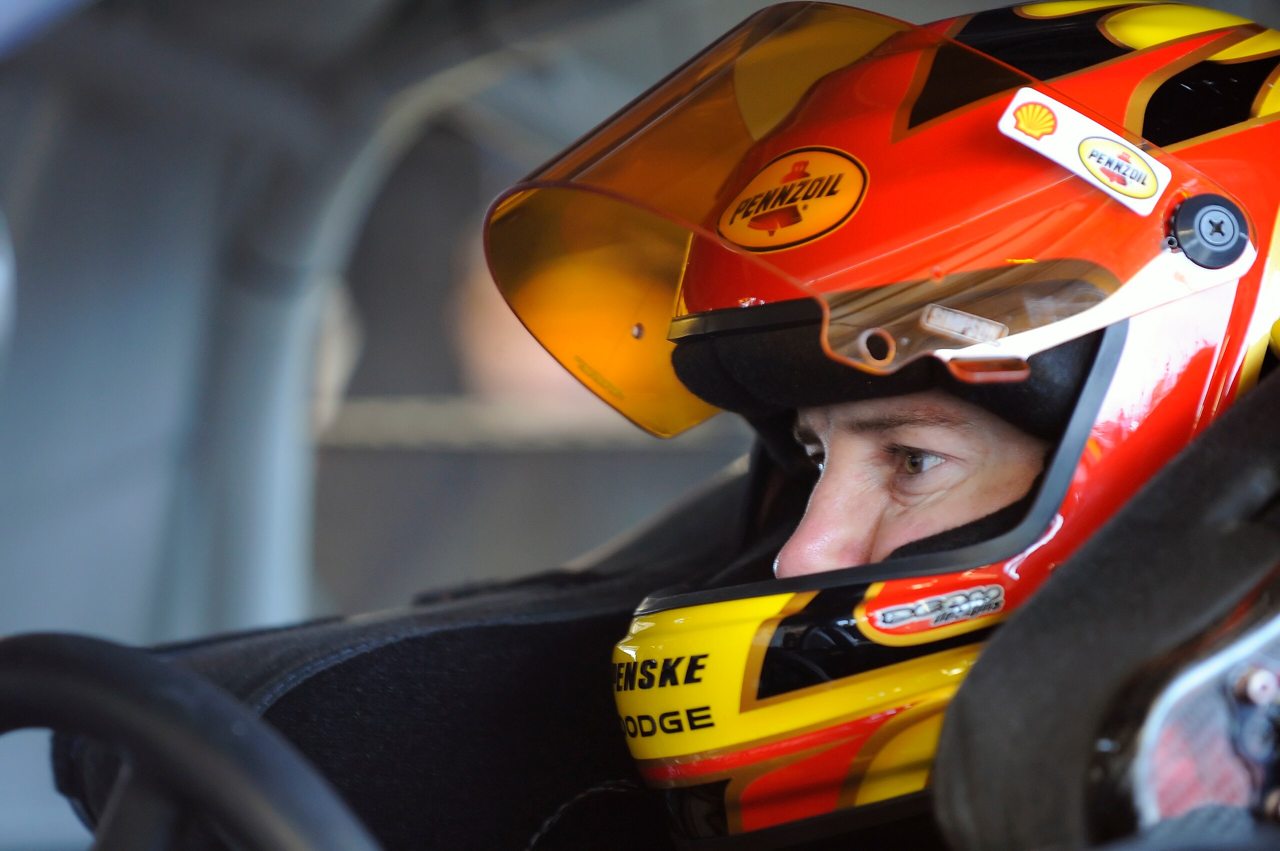 DAYTONA BEACH, FL - JANUARY 22:  Kurt Busch, driver of the #22 Shell/Pennzoil Dodge, waits in his car prior to testing at Daytona International Speedway on January 22, 2011 in Daytona Beach, Florida.  (Photo by Jared C. Tilton/Getty Images for NASCAR)