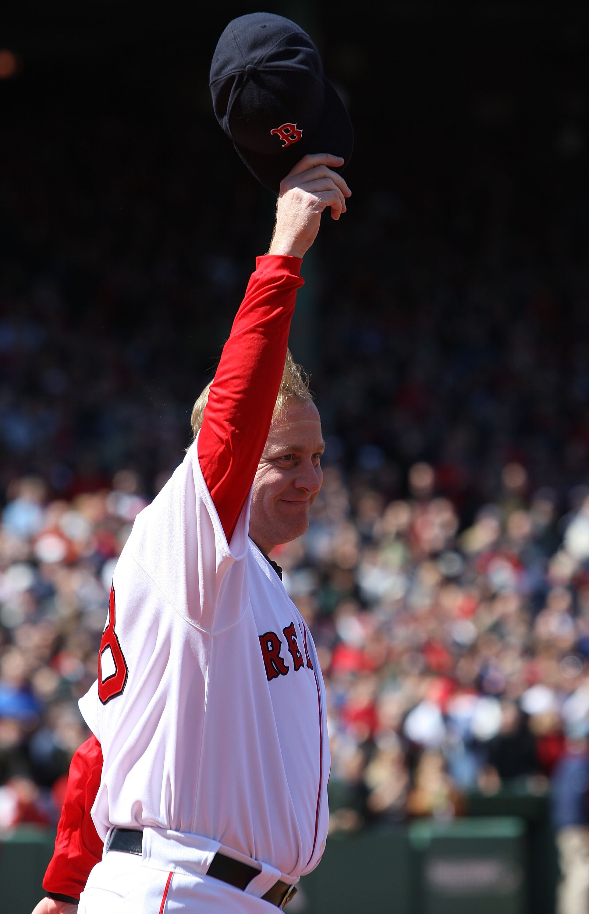BOSTON - APRIL 08:  Curt Schilling #38 of the Boston Red Sox  heads out on to the field to get his 2007 World Series Championship Ring before the game the Detroit Tigers on April 8,2008 during Opening Day at Fenway Park in Boston, Massachusetts.  (Photo b