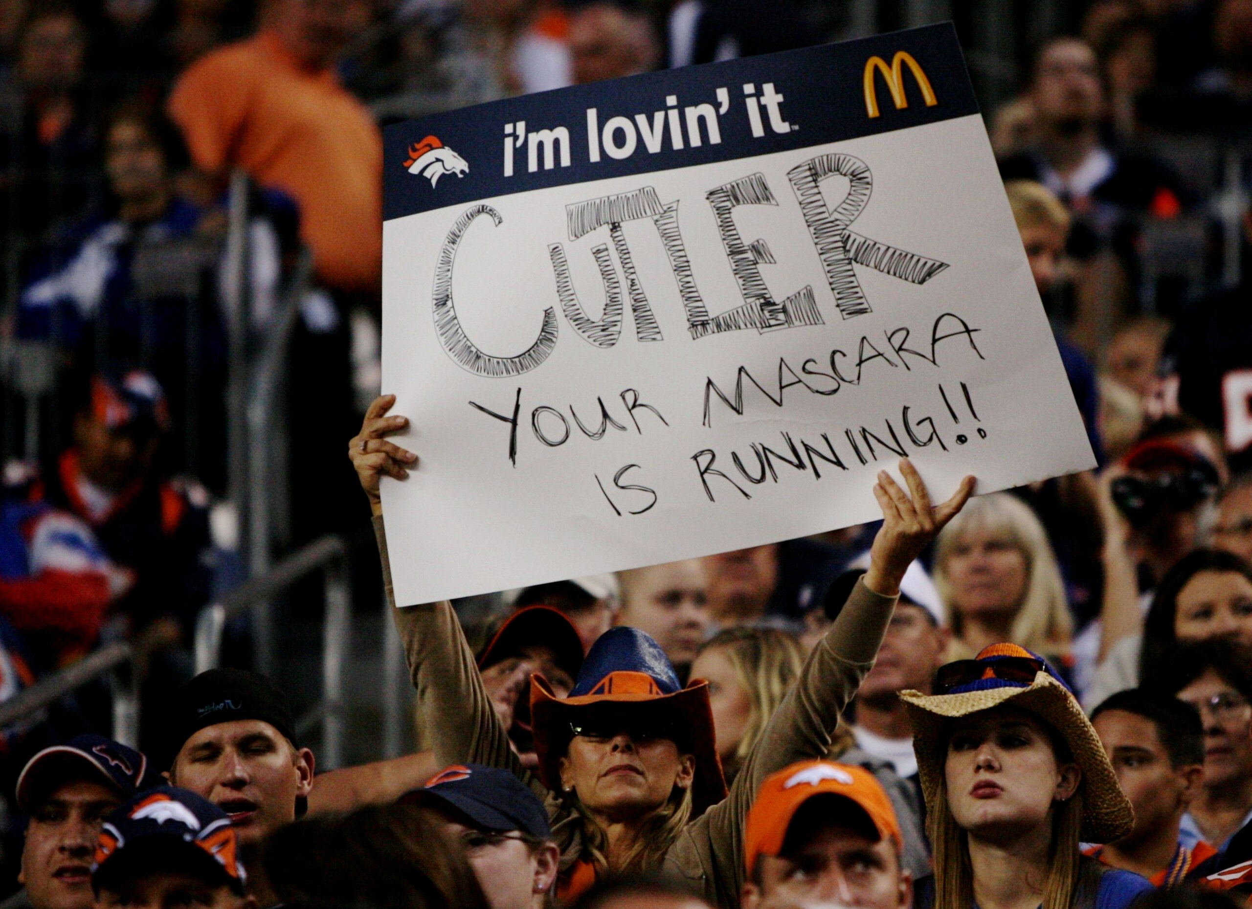 DENVER - AUGUST 30:  A fan holds up a sign about quarterback Jay Cutler #6 (not shown) of the Chicago Bears during the preseason game against the Denver Broncos at INVESCO Field at Mile High on August 30, 2009 in Denver, Colorado.  (Photo by Doug Pensinge