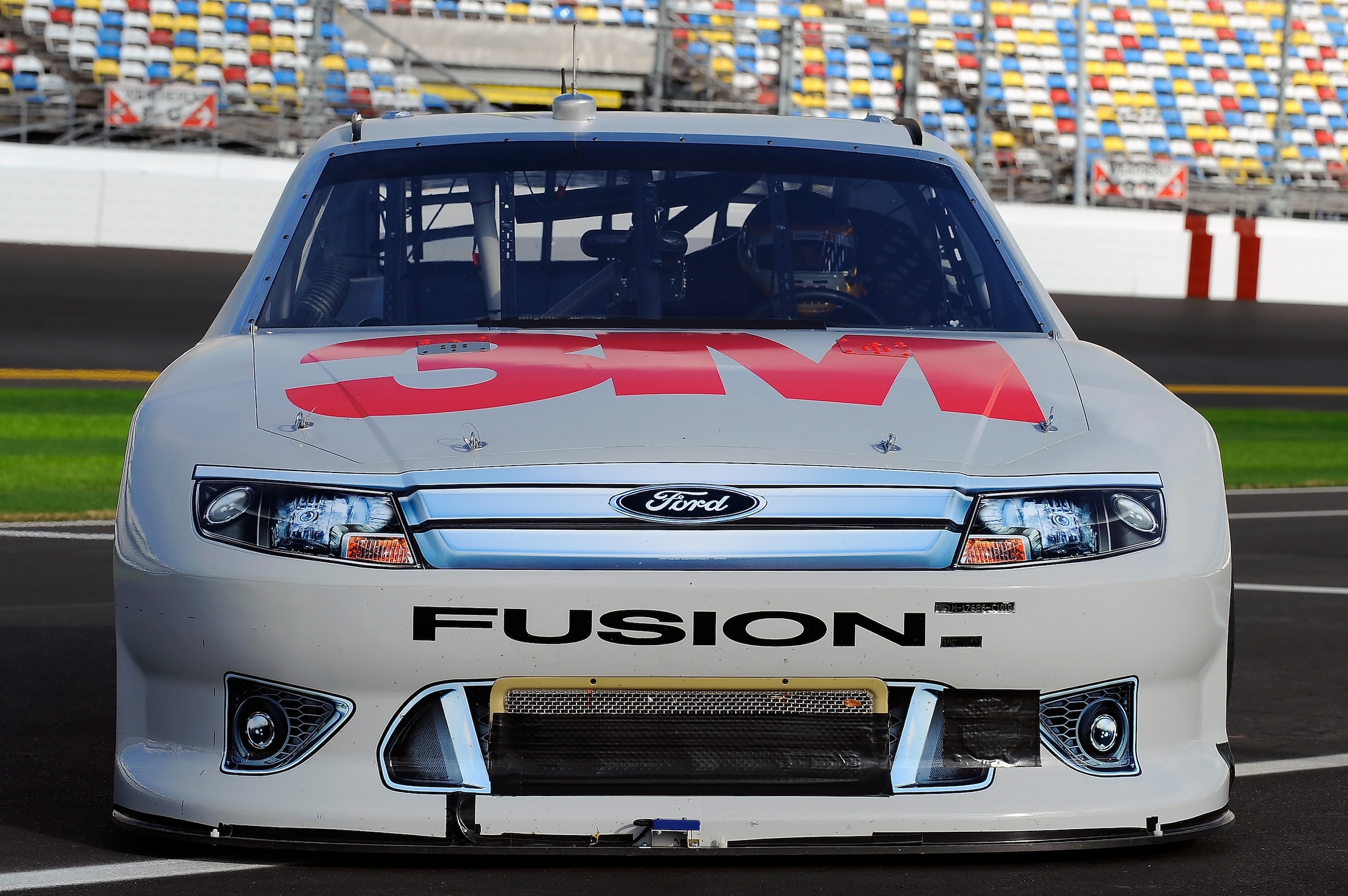 DAYTONA BEACH, FL - JANUARY 22:  Greg Biffle, driver of the #16 3M Ford, enters the garage during testing at Daytona International Speedway on January 22, 2011 in Daytona Beach, Florida.  (Photo by Jared C. Tilton/Getty Images for NASCAR)