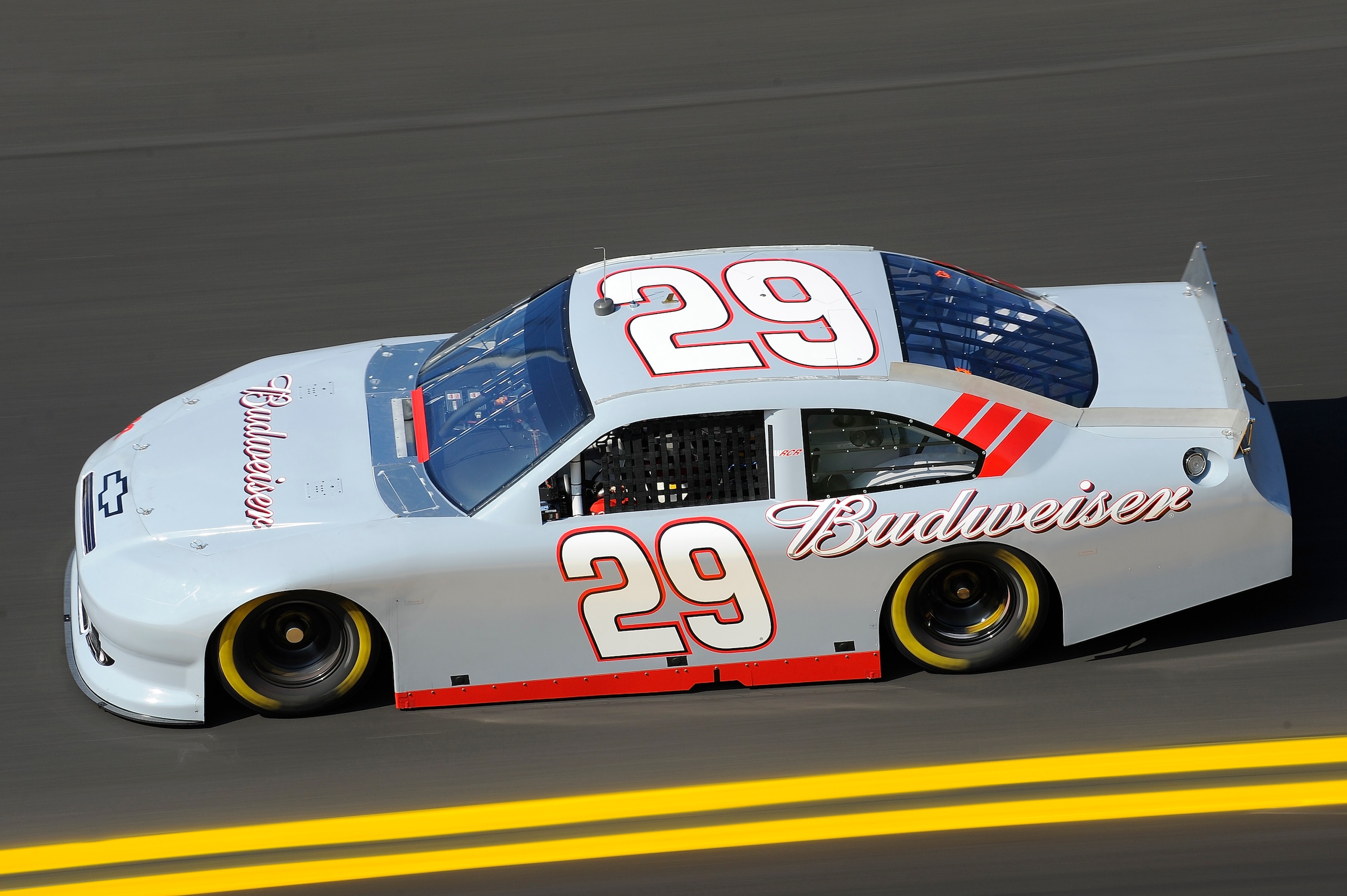 DAYTONA BEACH, FL - JANUARY 20:  Kevin Harvick, driver of the #29 Budweiser Chevrolet, holds the line in turn four during testing at Daytona International Speedway on January 20, 2011 in Daytona Beach, Florida.  (Photo by Jared C. Tilton/Getty Images for