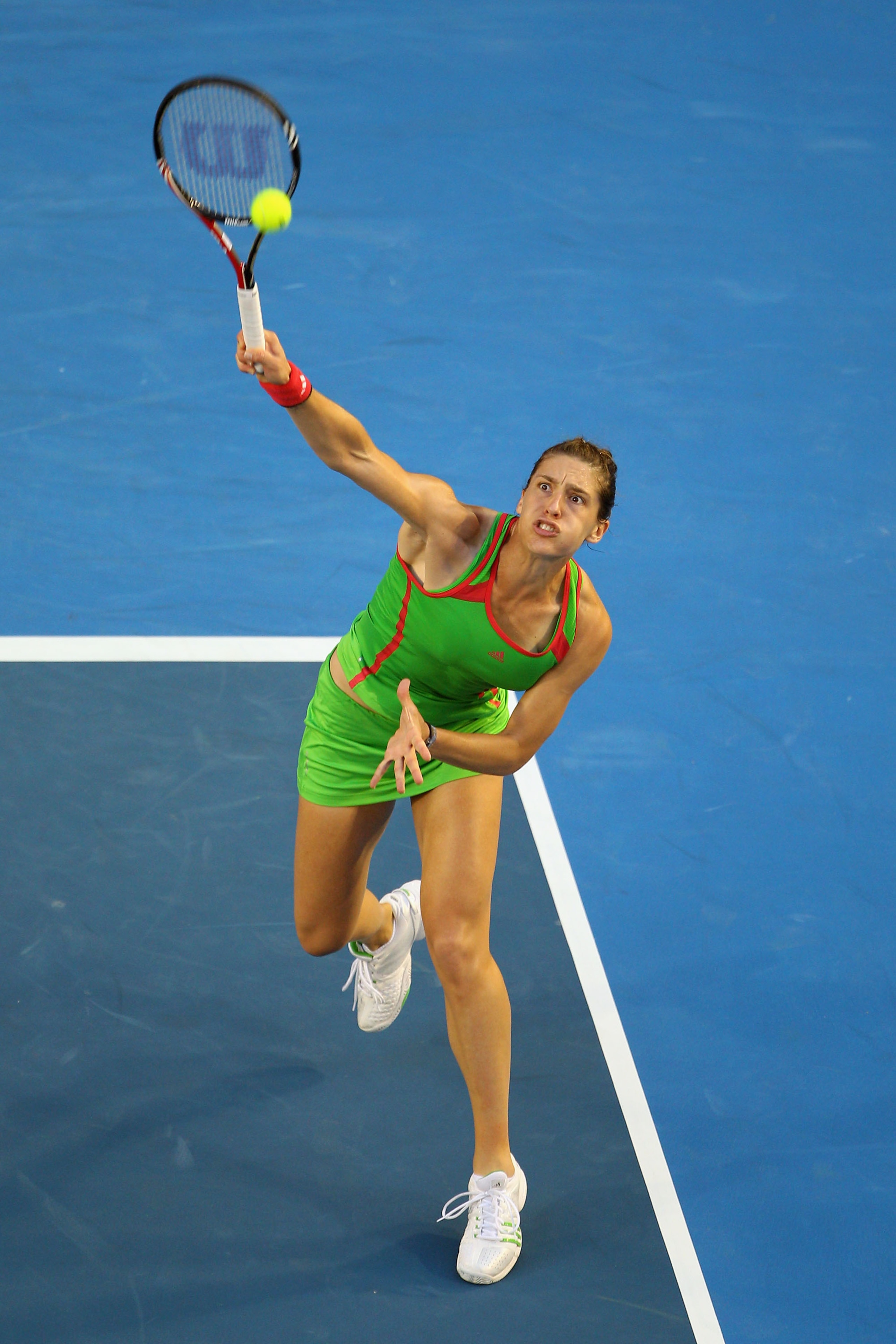 MELBOURNE, AUSTRALIA - JANUARY 23:  Andrea Petkovic of Germany plays a forehand smash in her fourth round match against Maria Sharapova of Russia during day seven of the 2011 Australian Open at Melbourne Park on January 23, 2011 in Melbourne, Australia.