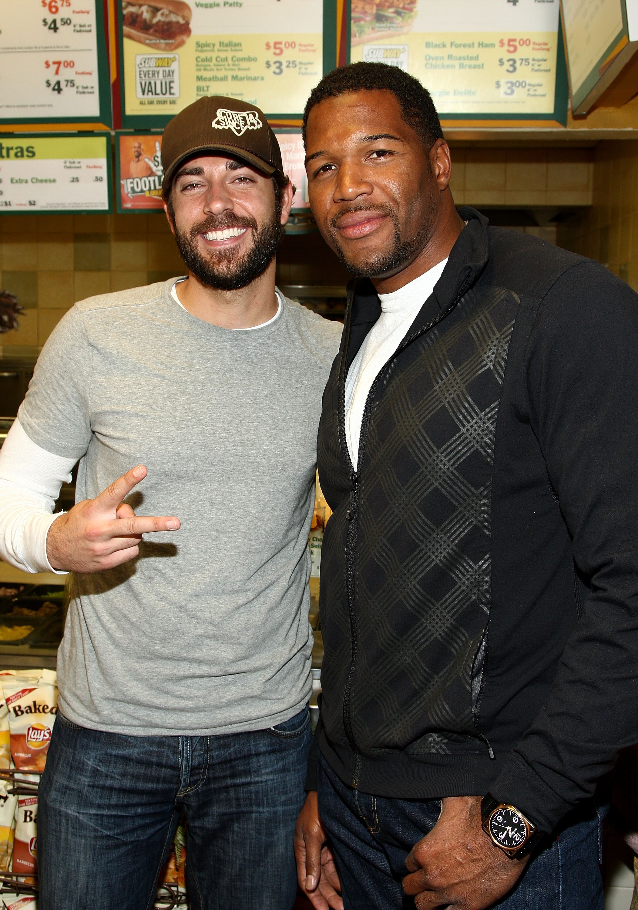 SANTA MONICA, CA - MAY 28:  Actor Zachary Levi and Subway spokesman Michael Strahan attend Universal Pictures and Subway restaurant's transformation of a local restaurant into 'Land of the Lost', Universal Pictures' new film on May 28, 2009 in Santa Monic
