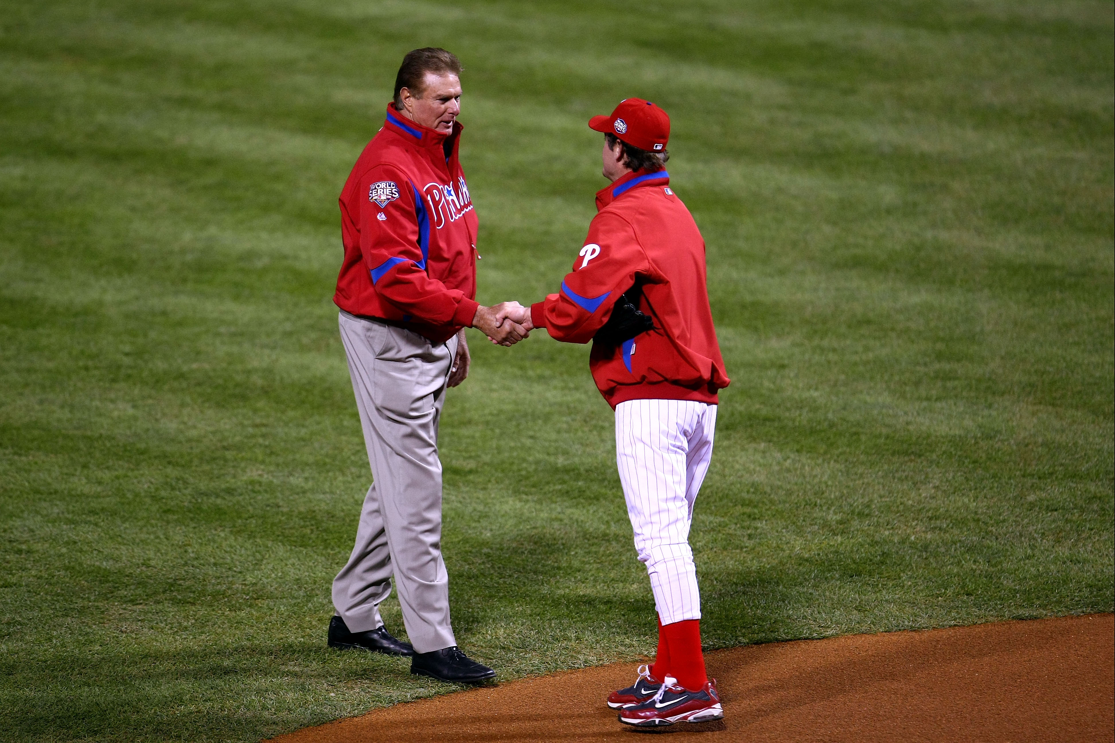 PHILADELPHIA - NOVEMBER 01:  Former Philadelphia Phillies pitcher of Baseball Hall of Famer Steve Carlton greets Jamie Moyer #50 of the Phillies after Carlton threw out the ceremonial first pitch prior to Game Four of the 2009 MLB World Series against the