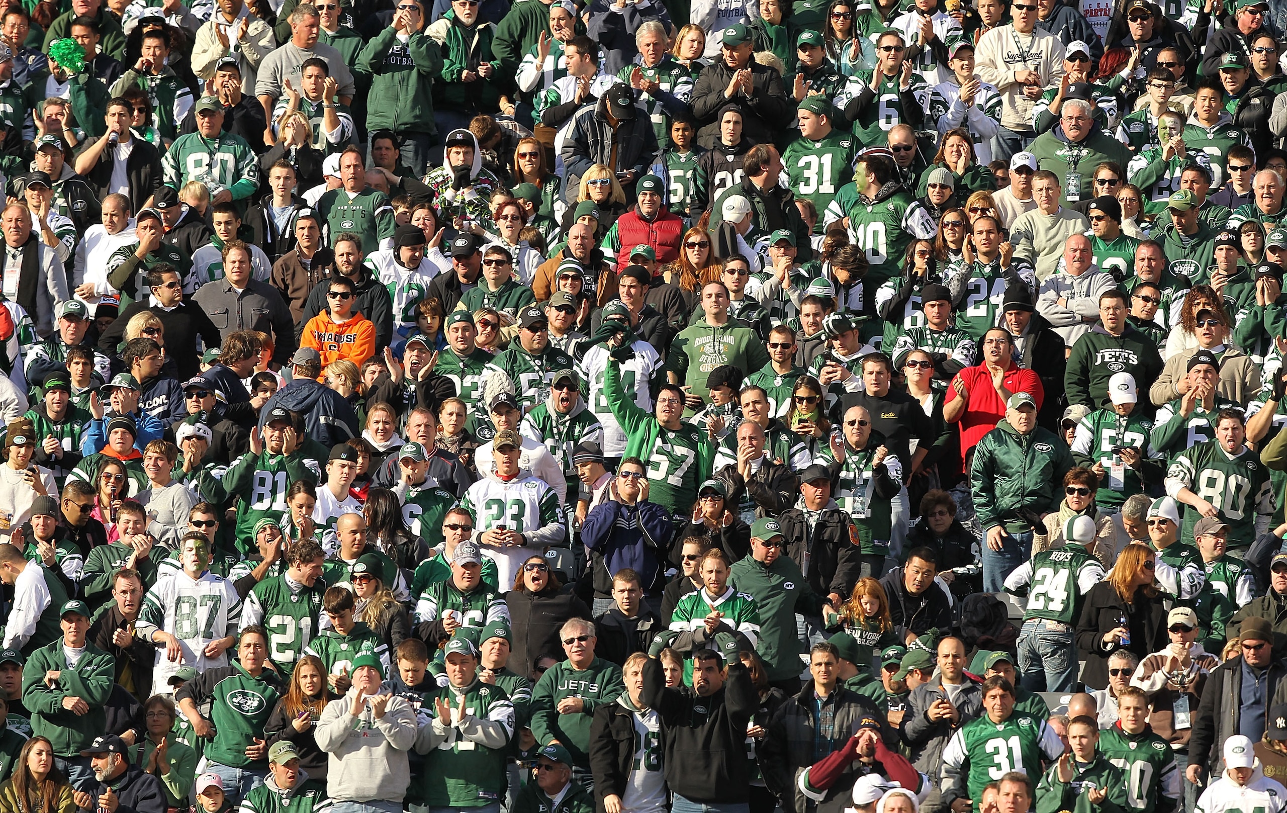 EAST RUTHERFORD, NJ - NOVEMBER 21: Fans of the New York Jets cheer against the Houston Texans during their game on November21, 2010 at the New Meadowlands Stadium in East Rutherford, New Jersey. (Photo by Al Bello/Getty Images) EAST RUTHERFORD, NJ - NOVEMBER 21: Fans of the New York Jets cheer against the Houston Texans during their game on November21, 2010 at the New Meadowlands Stadium in East Rutherford, New Jersey. (Photo by Al Bello/Getty Images)
