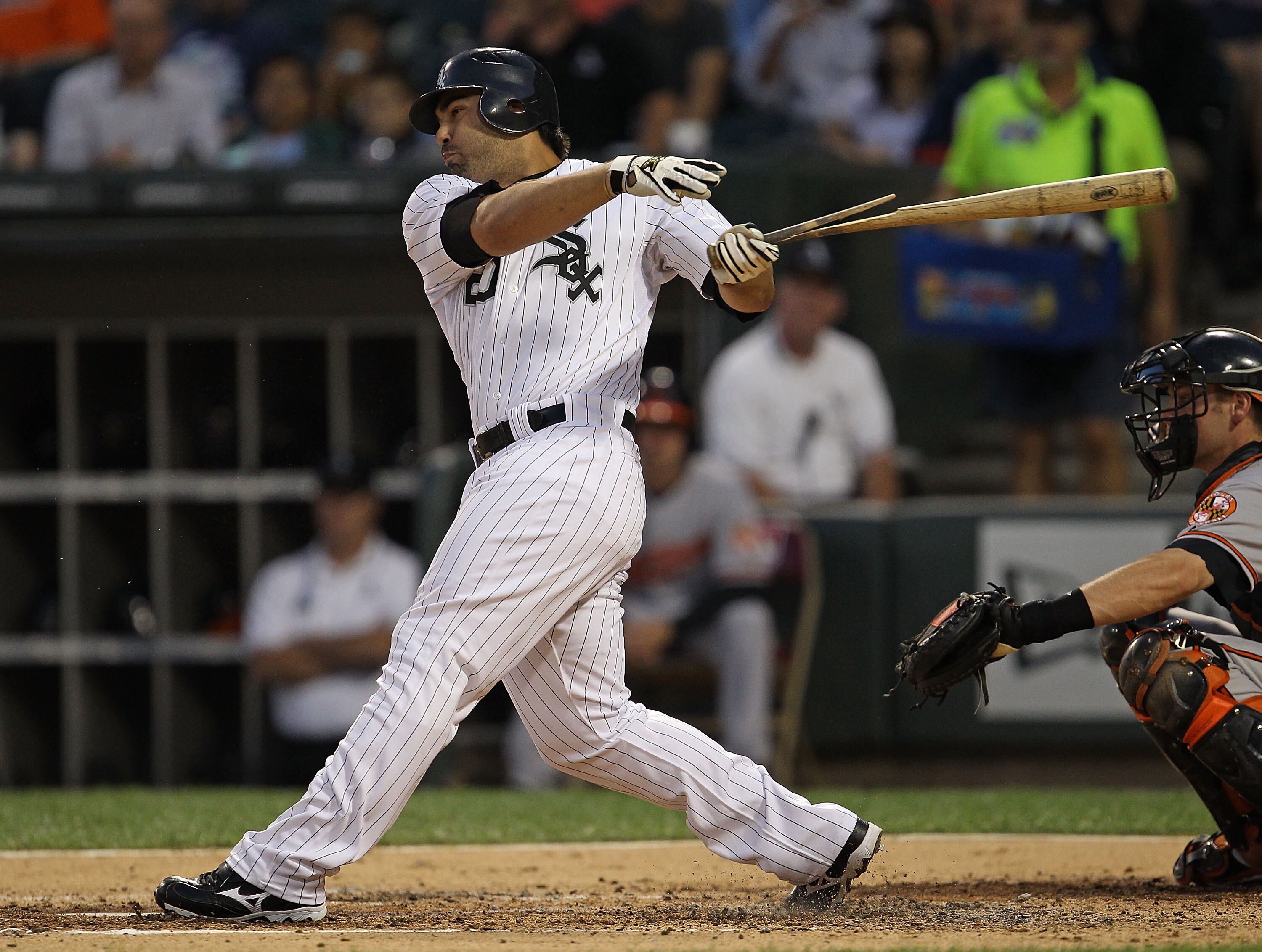 CHICAGO - AUGUST 25: Carlos Quentin #20 of the Chicago White Sox breaks his bat while hitting the ball against the Baltimore Orioles at U.S. Cellular Field on August 25, 2010 in Chicago, Illinois. The Orioles defeated the White Sox 4-2. (Photo by Jonathan