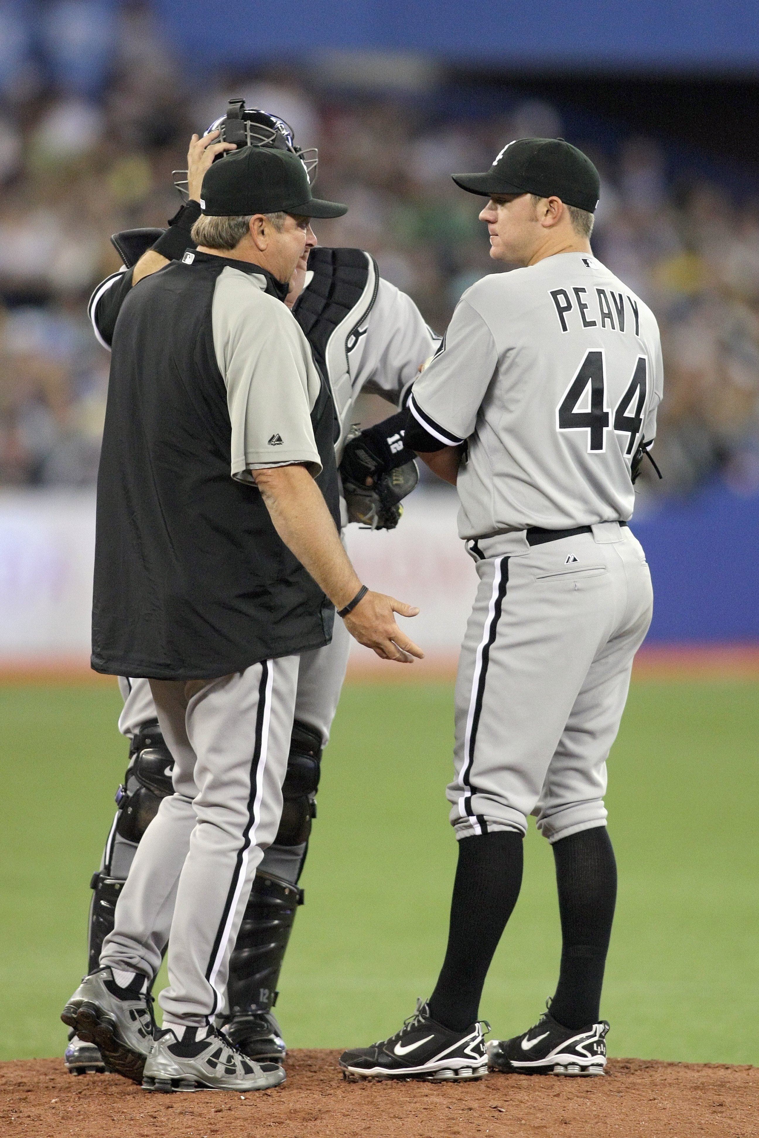 TORONTO - APRIL 12: Jake Peavy #44 of the Chicago White Sox listens to the pitching Don Cooper against the Toronto Blue Jays during their MLB game at the Rogers Centre on April 12, 2010 in Toronto, Ontario. (Photo By Dave Sandford/Getty Images)