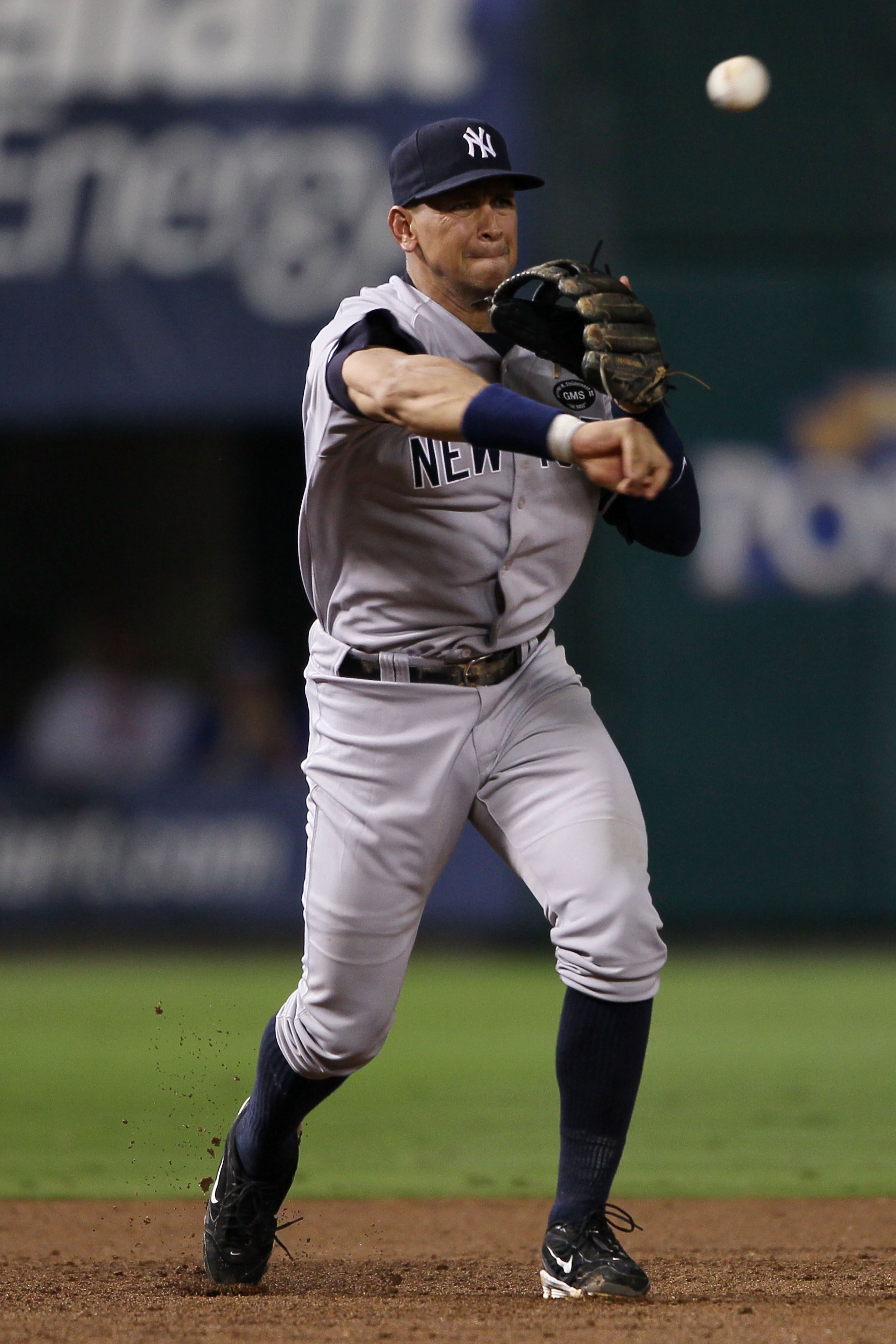 ARLINGTON, TX - OCTOBER 22: Alex Rodriguez #13 of the New York Yankees throws to first base after fielding the ball in the second inning of Game Six of the ALCS against the Texas Rangers during the 2010 MLB Playoffs at Rangers Ballpark in Arlington on Oc ARLINGTON, TX - OCTOBER 22: Alex Rodriguez #13 of the New York Yankees throws to first base after fielding the ball in the second inning of Game Six of the ALCS against the Texas Rangers during the 2010 MLB Playoffs at Rangers Ballpark in Arlington on Oc