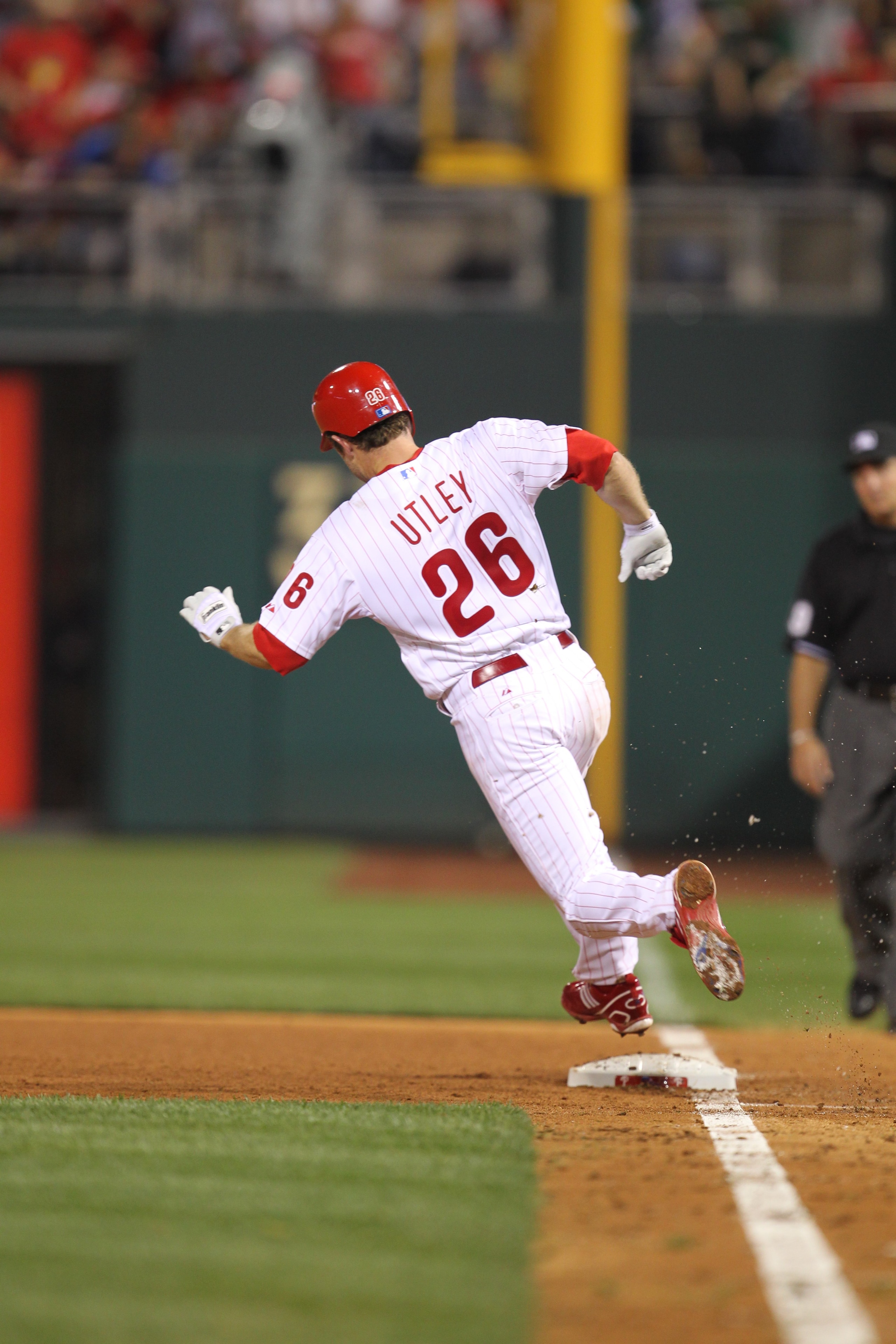PHILADELPHIA - MAY 2: Second baseman Chase Utley #26 of the Philadelphia Phillies runs to first base during a game against the New York Mets at Citizens Bank Park on May 2, 2010 in Philadelphia, Pennsylvania. The Phillies won 11-5. (Photo by Hunter Martin