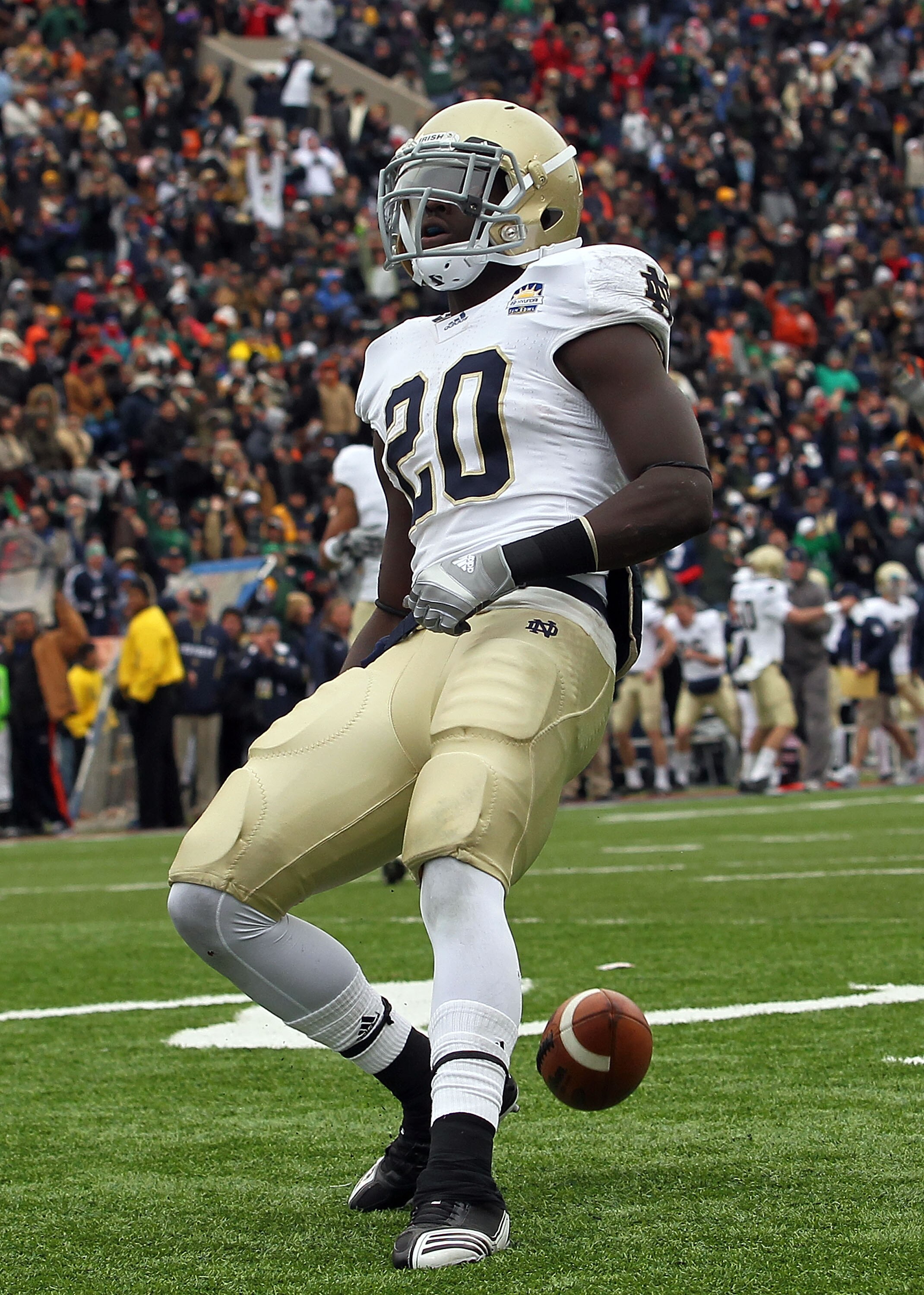 EL PASO, TX - DECEMBER 30:  Running back Cierre Wood #20 of the Notre Dame Fighting Irish celebrates a touchdown against the Miami Hurricanes during the Hyundai Sun Bowl at Sun Bowl on December 30, 2010 in El Paso, Texas.  (Photo by Ronald Martinez/Getty 