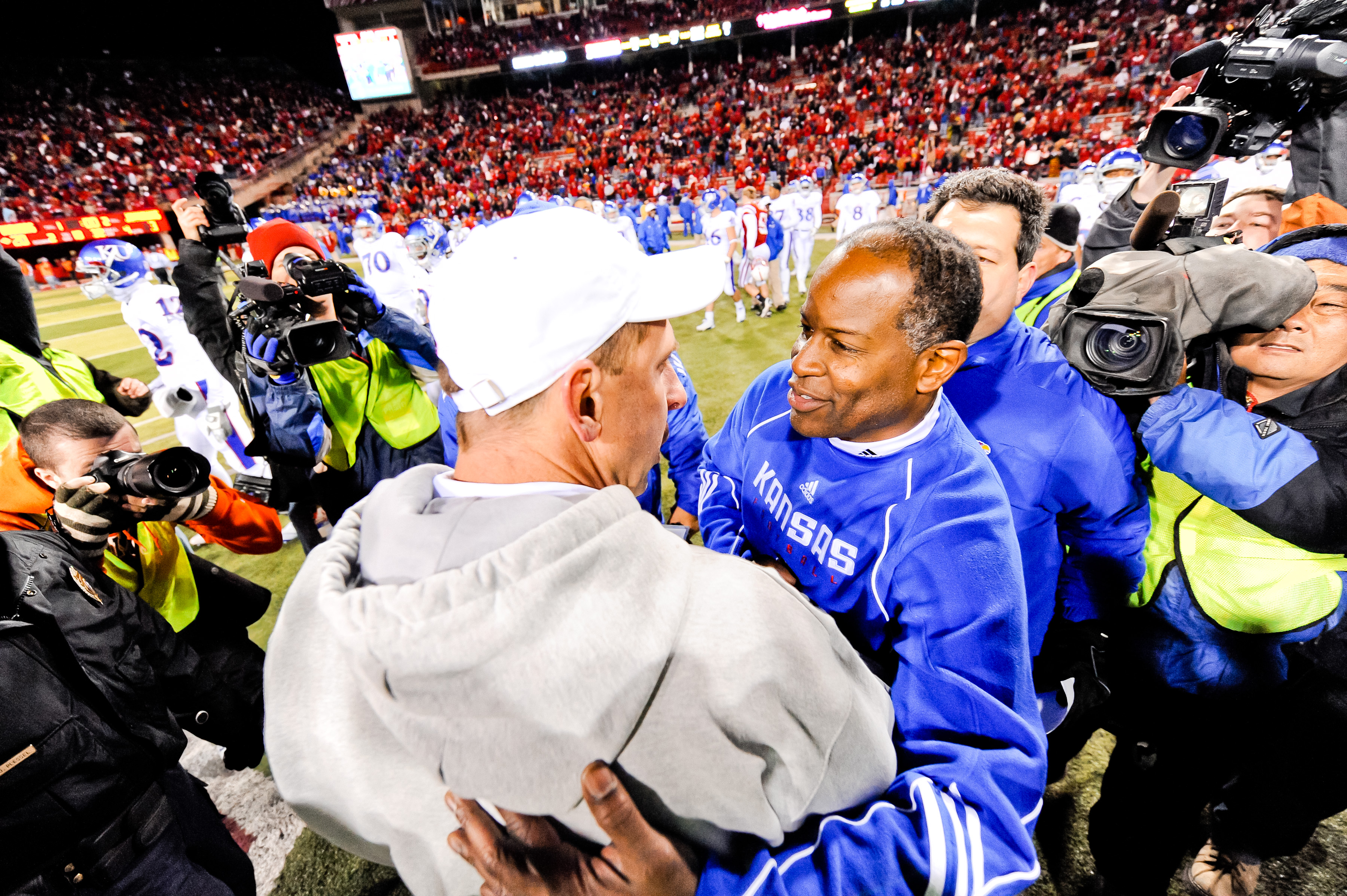 LINCOLN, NE - NOVEMBER 13: Coach Turner Gill or the Kansas Jawhawks shakes the hand of Coach Bo Pelini of the Nebraska Cornhuskers after their game at Memorial Stadium on November 13, 2010 in Lincoln, Nebraska. Nebraska Defeated Kansas 20-3. Gill is both