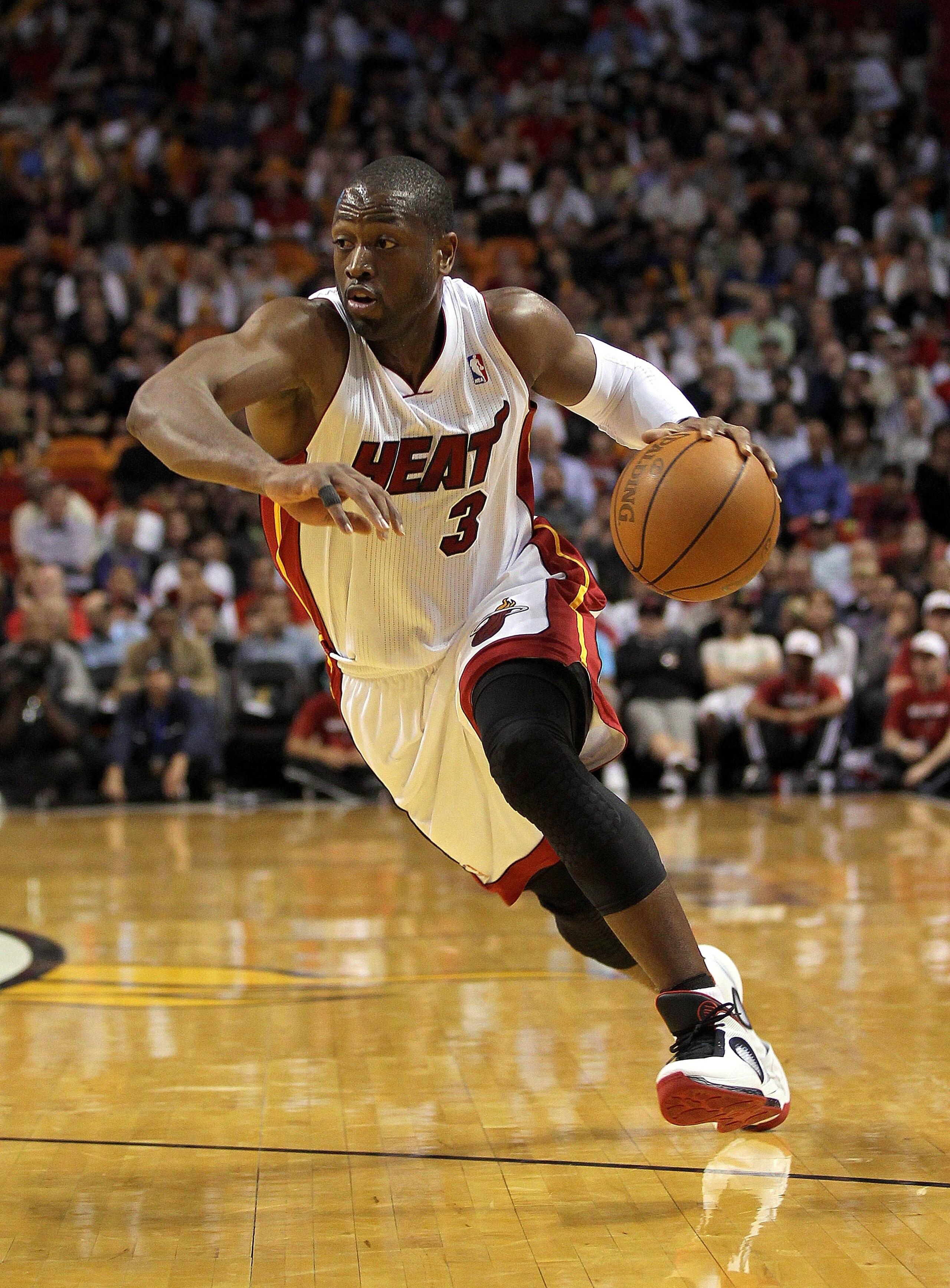 MIAMI, FL - JANUARY 18:  Dwyane Wade #3 of the Miami Heat drives to the lane during a game against the Atlanta Hawks at American Airlines Arena on January 18, 2011 in Miami, Florida. NOTE TO USER: User expressly acknowledges and agrees that, by downloadin