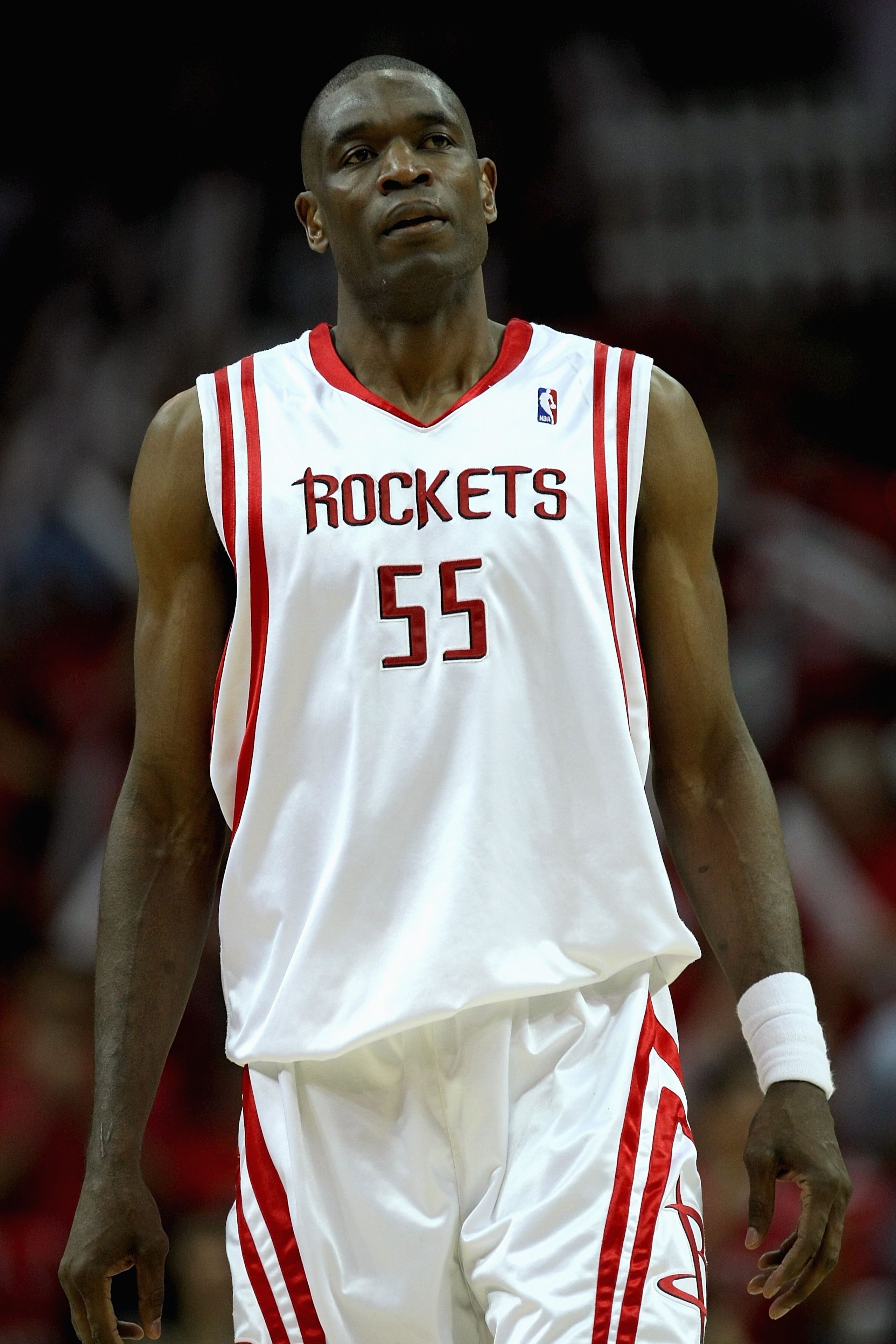 HOUSTON - APRIL 19:  Dikembe Mutombo #55 of the Houston Rockets walks across the court in Game One of the Western Conference Quarterfinals against the Utah Jazz during the 2008 NBA Playoffs on April 19, 2008 at the Toyota Center in Houston, Texas.  The Ja