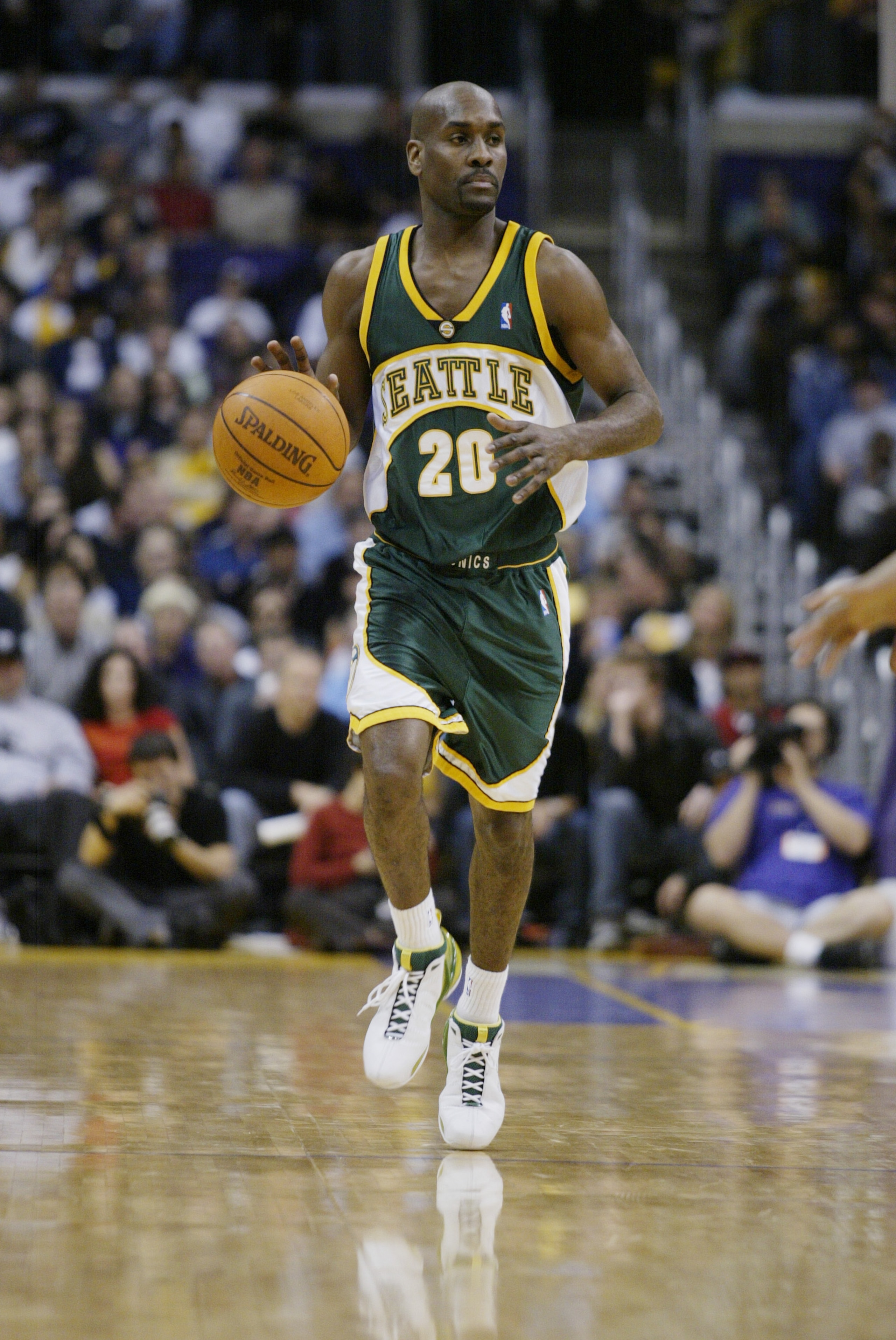 LOS ANGELES - JANUARY 7:  Gary Payton #20 of the Seattle Sonics moves the ball upcourt during the game against the Los Angeles Lakers at Staples Center on January 7, 2003 in Los Angeles, California.  The Lakers won 119-98.  NOTE TO USER: User expressly ac