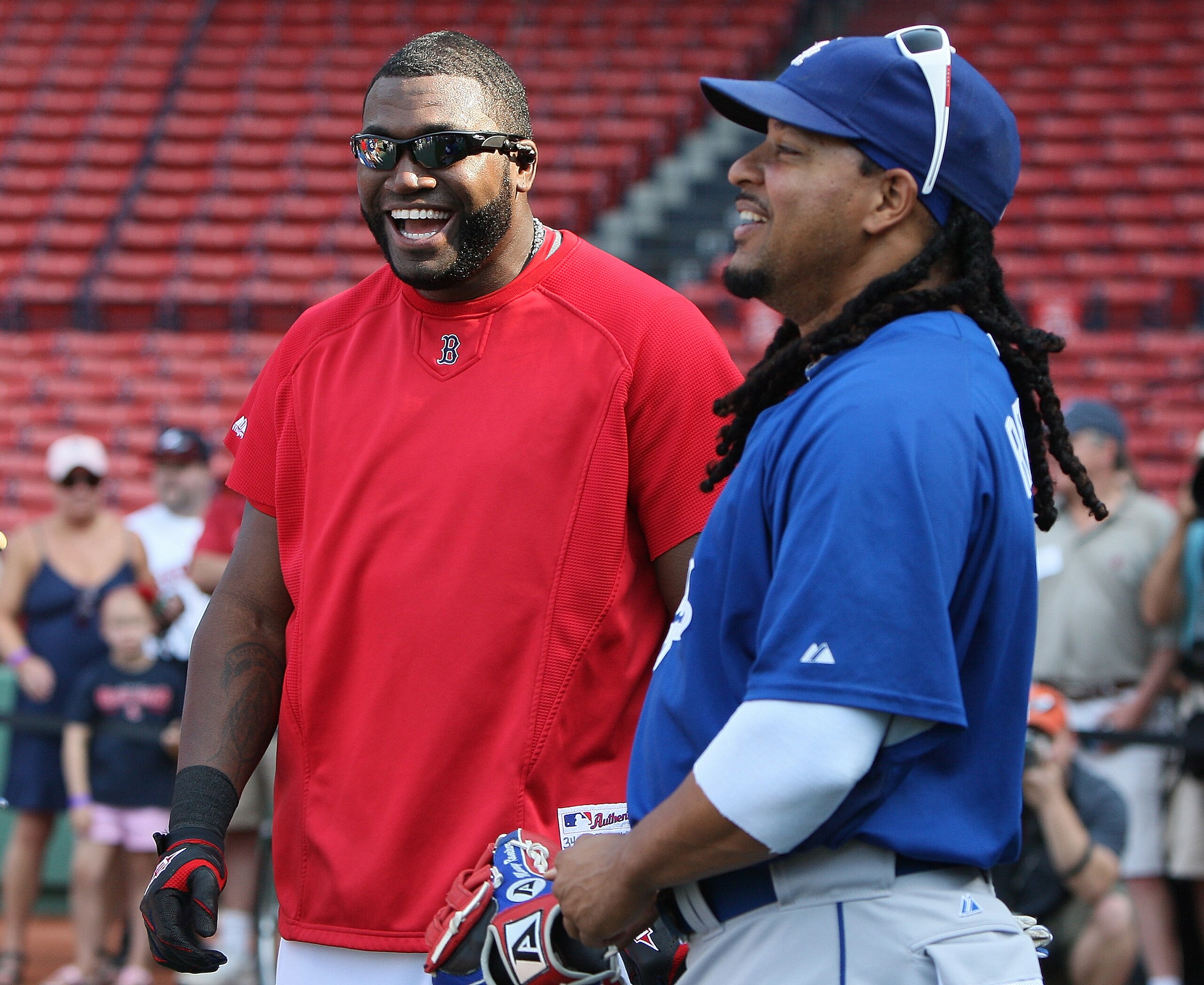 BOSTON - JUNE 18:  Manny Ramirez #99 of the Los Angeles Dodgers interacts with former teammate David Ortiz of the Boston Red Sox before a game at Fenway Park on June 18, 2010 in Boston, Massachusetts. (Photo by Jim Rogash/Getty Images)
