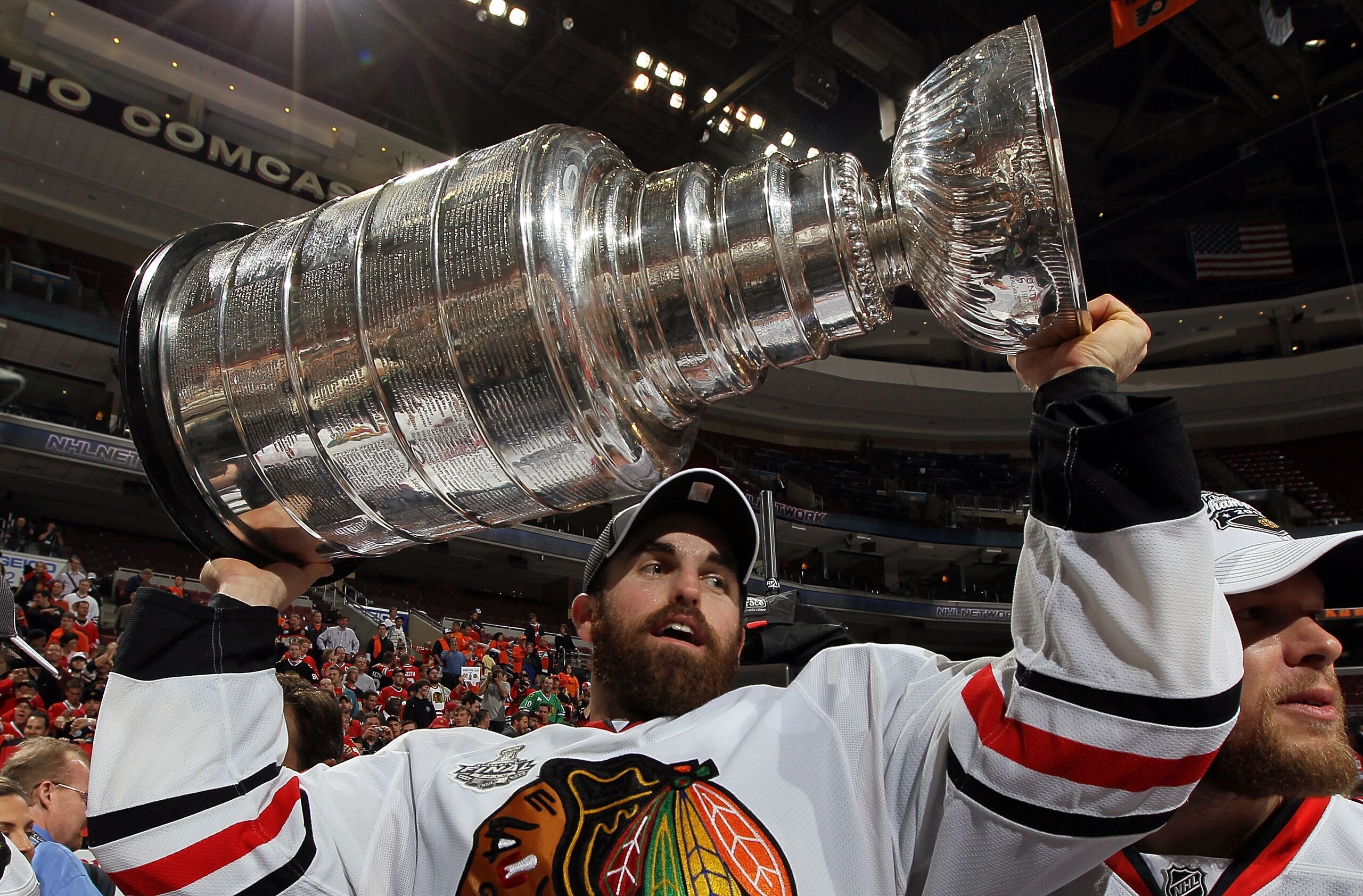 PHILADELPHIA - JUNE 09: Andrew Ladd #16 of the Chicago Blackhawks hoists the Stanley Cup after teammate Patrick Kane scored the game-winning goal in overtime to defeat the Philadelphia Flyers 4-3 and win the Stanley Cup in Game Six of the 2010 NHL Stanle PHILADELPHIA - JUNE 09: Andrew Ladd #16 of the Chicago Blackhawks hoists the Stanley Cup after teammate Patrick Kane scored the game-winning goal in overtime to defeat the Philadelphia Flyers 4-3 and win the Stanley Cup in Game Six of the 2010 NHL Stanle