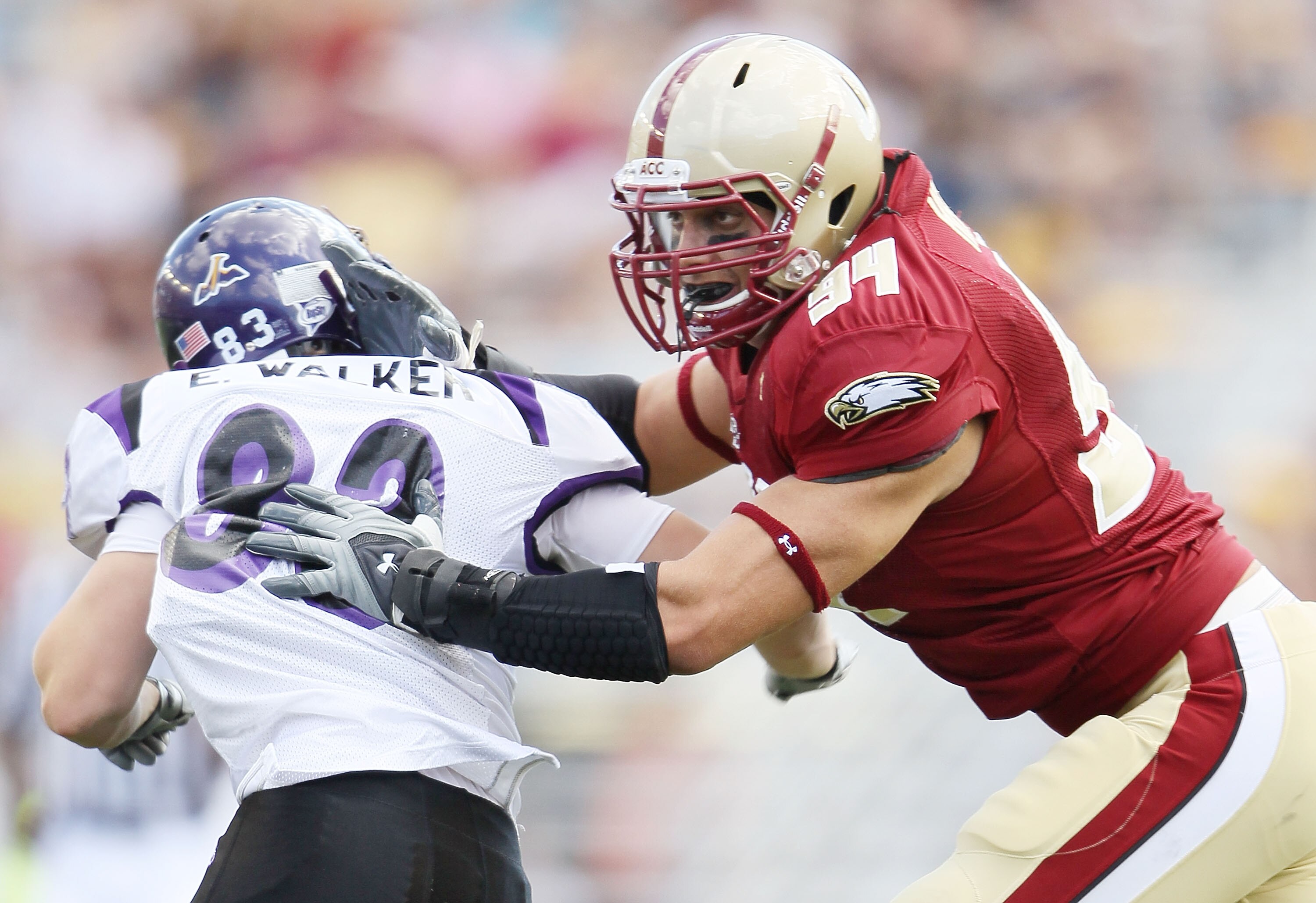 CHESTNUT HILL, MA - SEPTEMBER 04:  Mark Herzlich #94 of the Boston College Eagles blocks Erik Walker #83 of the Weber State Wildcats on September 4, 2010 at Alumni Stadium in Chestnut Hill, Massachusetts. Boston College defeated Weber State 38-20.  (Photo