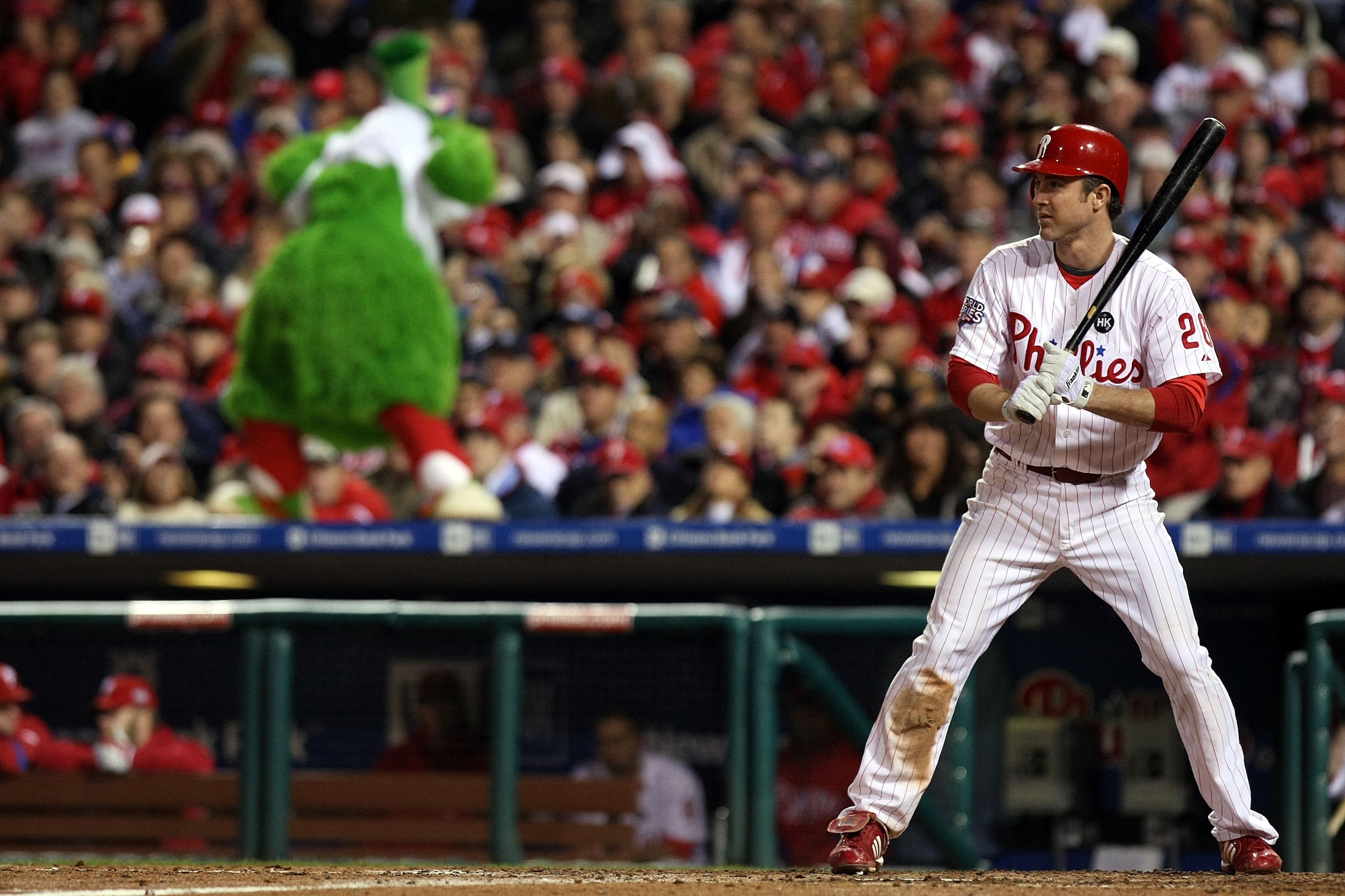 PHILADELPHIA - NOVEMBER 02:  Chase Utley #26 of the Philadelphia Phillies bats against the New York Yankees as the Philly Phanatic watches from the top of the dugout in Game Five of the 2009 MLB World Series at Citizens Bank Park on November 2, 2009 in Ph