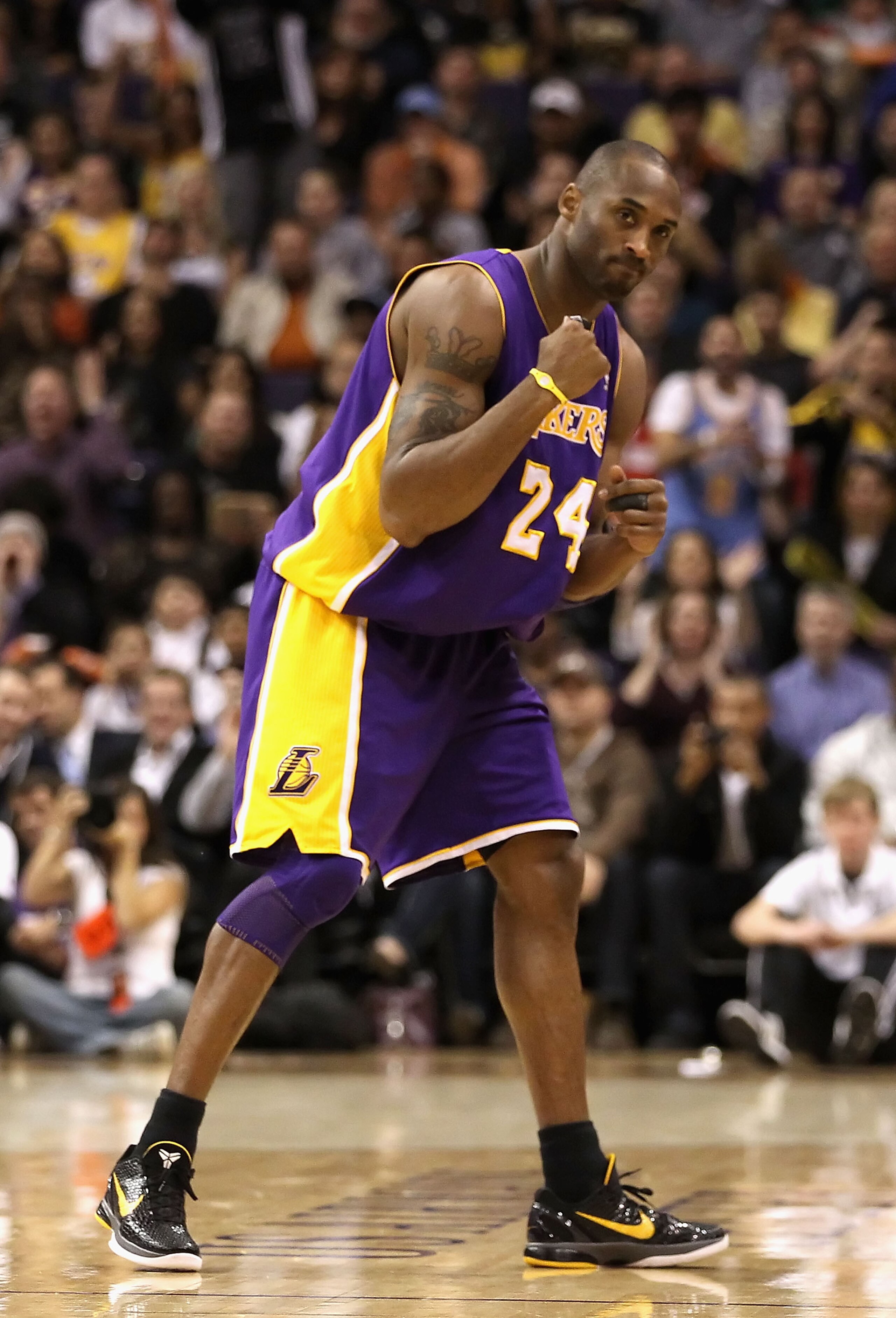 PHOENIX - JANUARY 05: Kobe Bryant #24 of the Los Angeles Lakers pumps his fist after a fould was called against the Phoenix Suns during the NBA game at US Airways Center on January 5, 2011 in Phoenix, Arizona. NOTE TO USER: User expressly acknowledges and PHOENIX - JANUARY 05: Kobe Bryant #24 of the Los Angeles Lakers pumps his fist after a fould was called against the Phoenix Suns during the NBA game at US Airways Center on January 5, 2011 in Phoenix, Arizona. NOTE TO USER: User expressly acknowledges and